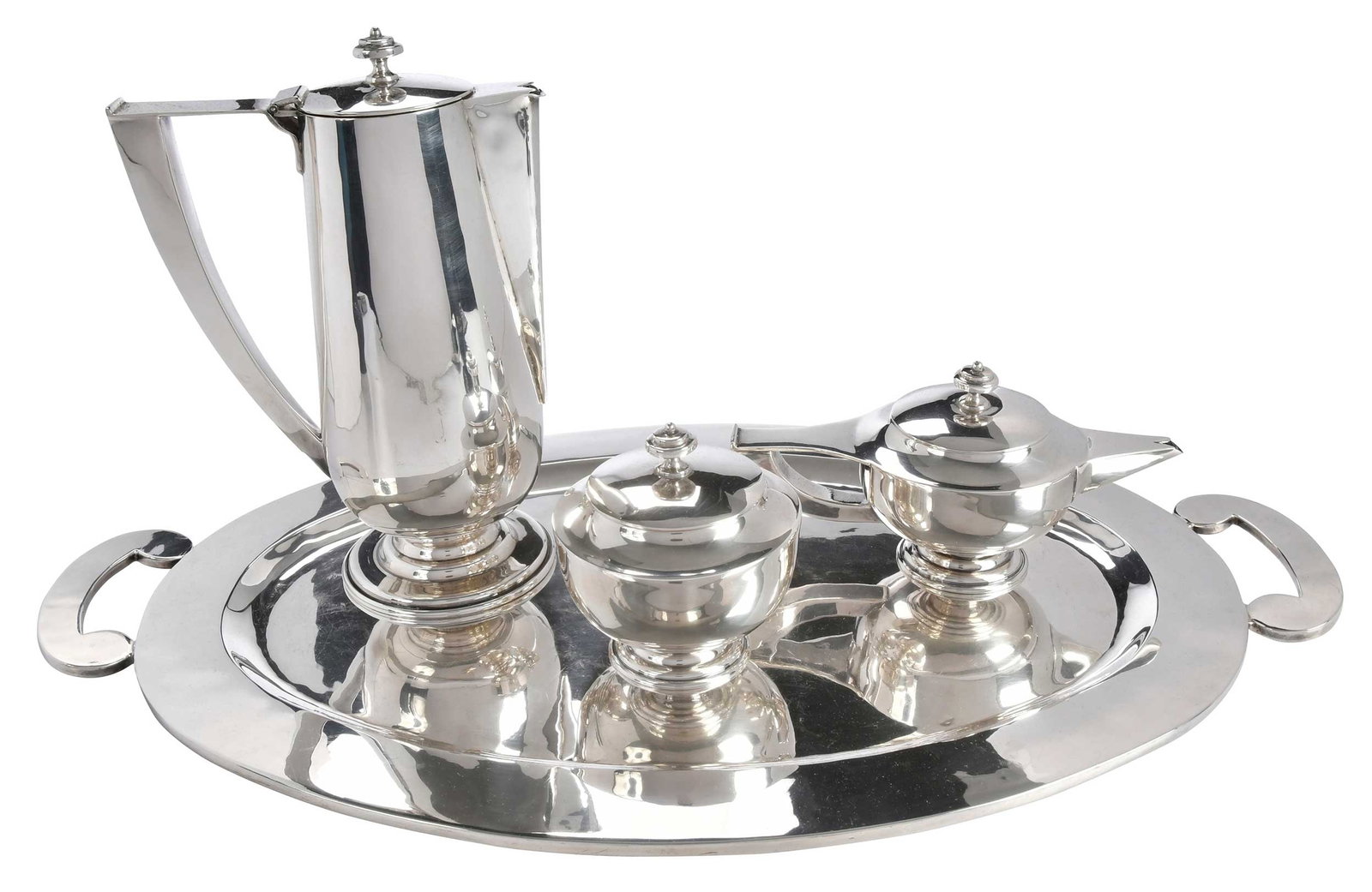 Three Piece Modern Mexican Sterling Coffee Service: Mexico City, 20th century, dramatic clean lines, no monogram, marks for Louvre, 117.09 oz. T., including 10 in. coffee pot with matching lidded creamer, covered sugar, and 23 in. two handle tray Prove
