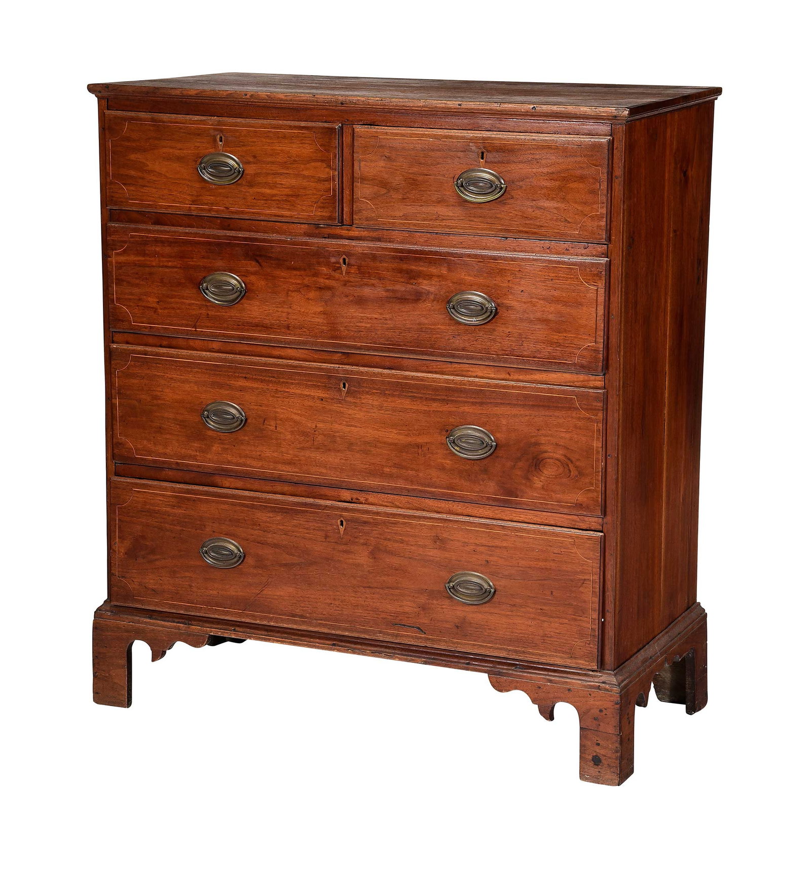 Southern Federal Inlaid Walnut Chest of Drawers: probably Piedmont, North Carolina, early 19th century, two short over three long graduated dovetailed drawers with inlaid stringing and thumbnail molded edges, tall bracket feet with scrolled