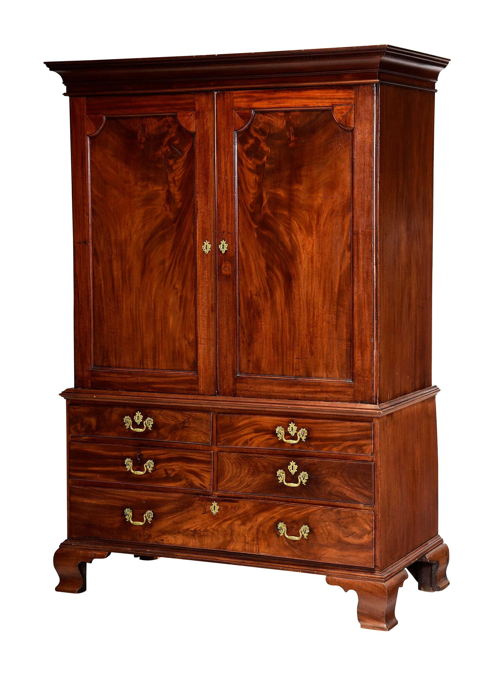 American Chippendale Figured Walnut Linen Press: Southern or Mid Atlantic, late 18th century, top section with dentil molded cornice, linen slides to interior, lower section with five drawers, bold ogee bracket feet, yellow pine and poplar