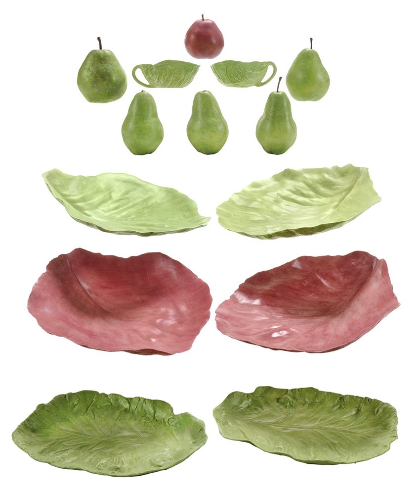 Fourteen Pieces Mary K. Kelly Ceramic: Fruit and Table Articles American/Alabama, late 20th century, including two red cabbage leaf trays, signed and dated 1993, 3-1/2 x 12-1/4 x 11-7/8 in., [both in good conditon]; two green cabbage leaf 
