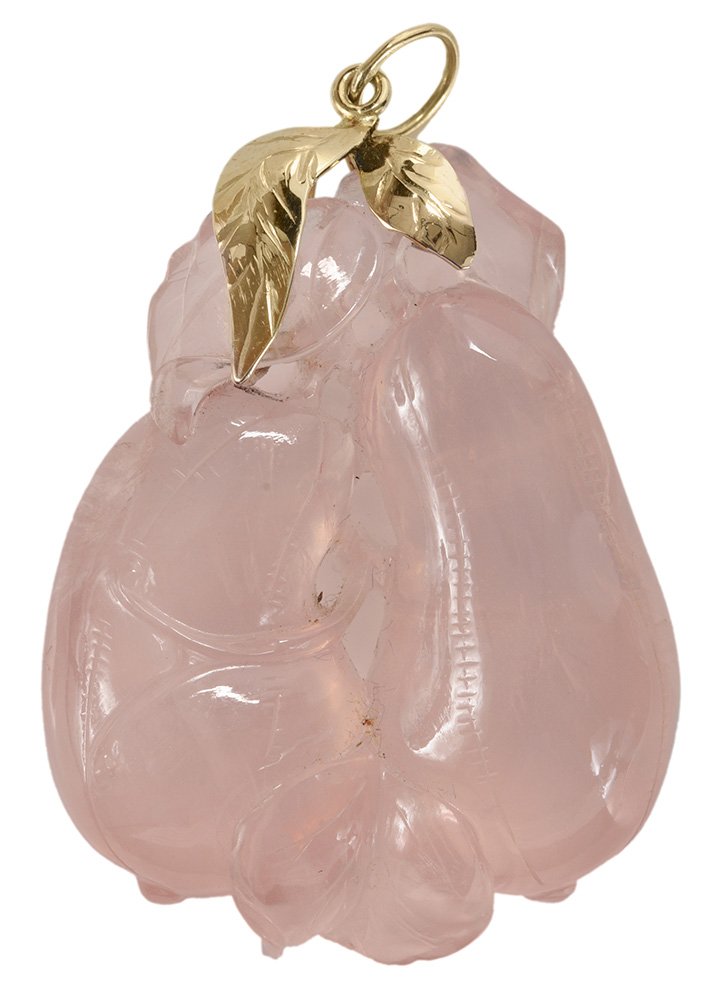 Rose Quartz Pendant: hand-carved in pear and leaf motif, tested 14 kt. yellow gold leaves and bail, 49 grams gross weight, 2-3/4 x 2 in. scratches to quartz, one leaf tip at lower end chipped Provenance: Private Florida C