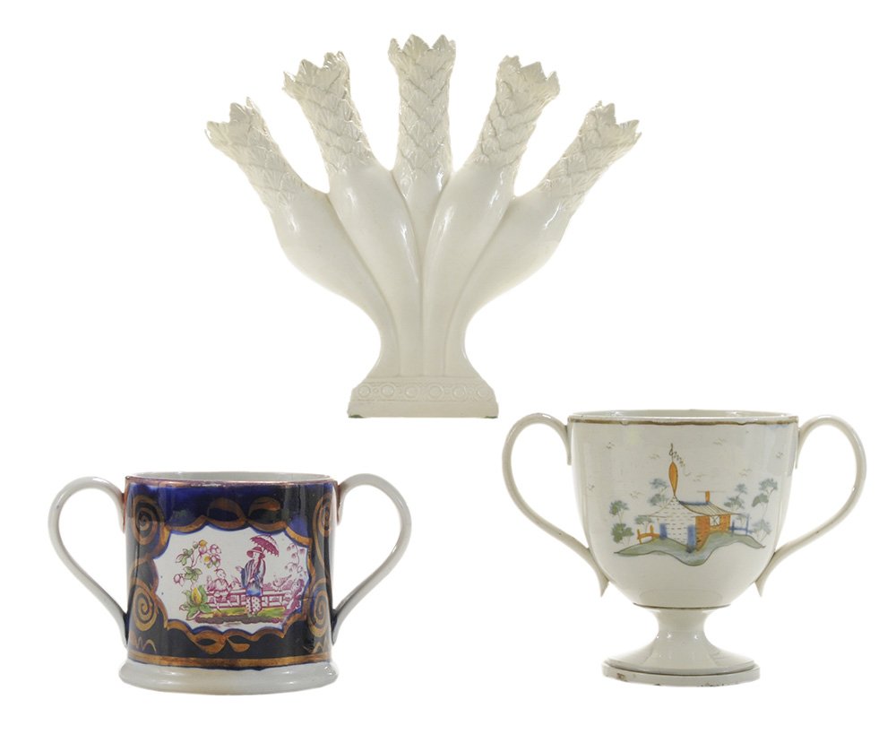 Three Pieces of Creamware: English, 19th century, including a Leeds creamware quintal with five pointed palmette nozzles raised on a rectangular platform base with repeating banding, 7-3/4 x 9 in., [star cracks to glaze on body