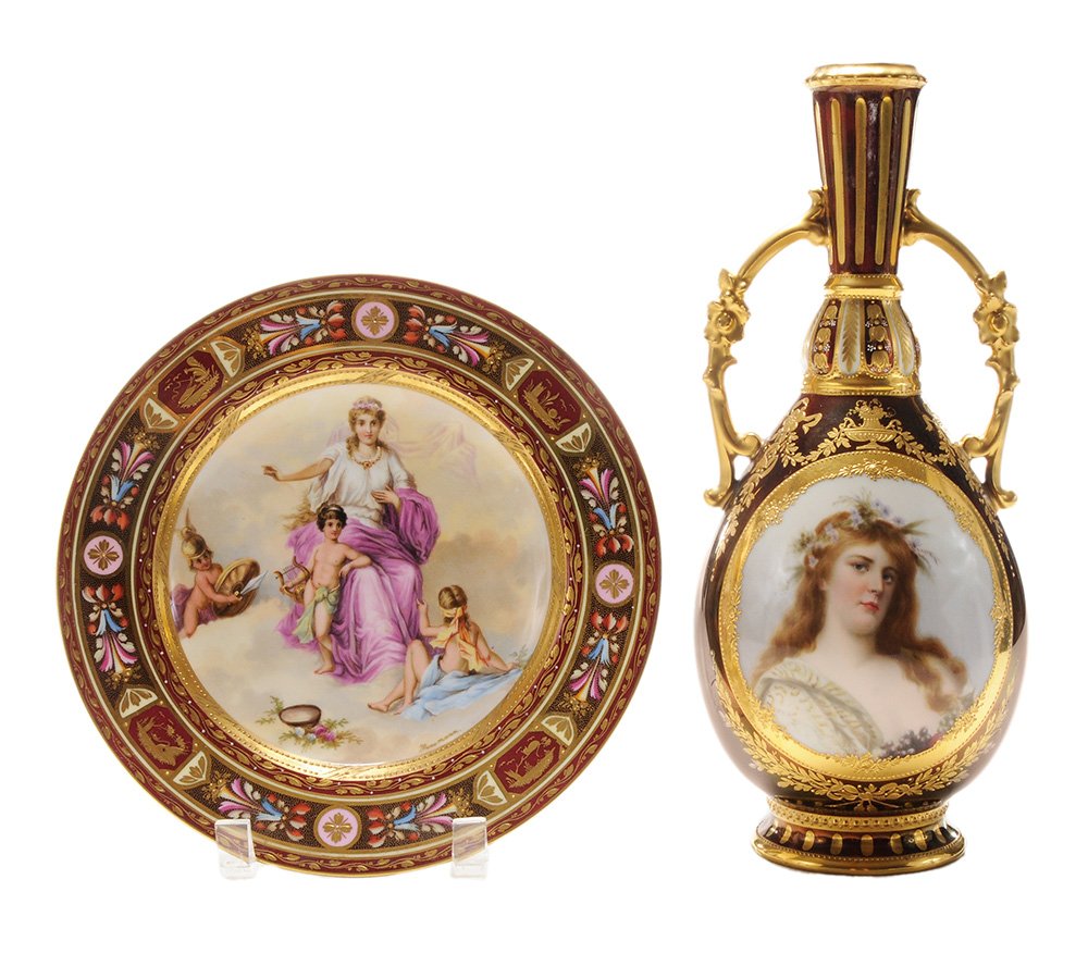 Berlin Hand-Painted Bowl and Double: Handled Urn German, late 19th/early 20th century: one heavily gilt and enamelled hand-painted bowl titled "Venus u. Amor," signed "Hausmann", entitled in verso, 1-1/2 x 9-1/2 in., [minor losses to gil