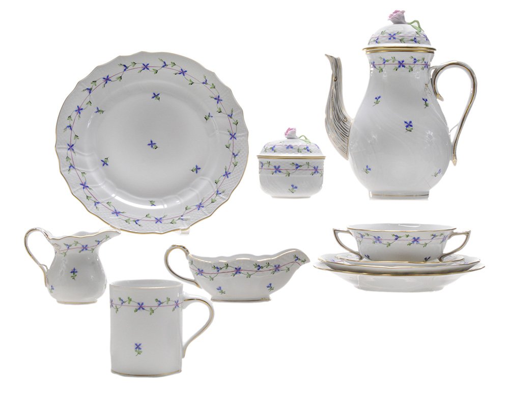 Herend Blue Garland Partial Dinner: Service, 62 Pieces Hungary, 20th century, gilt-decorated and marked in blue consisting of 11 plates, 10-1/4 in., [one with large chip], two plates, 11 in.; six salad plates, 7-3/4 in.; ten bread plate