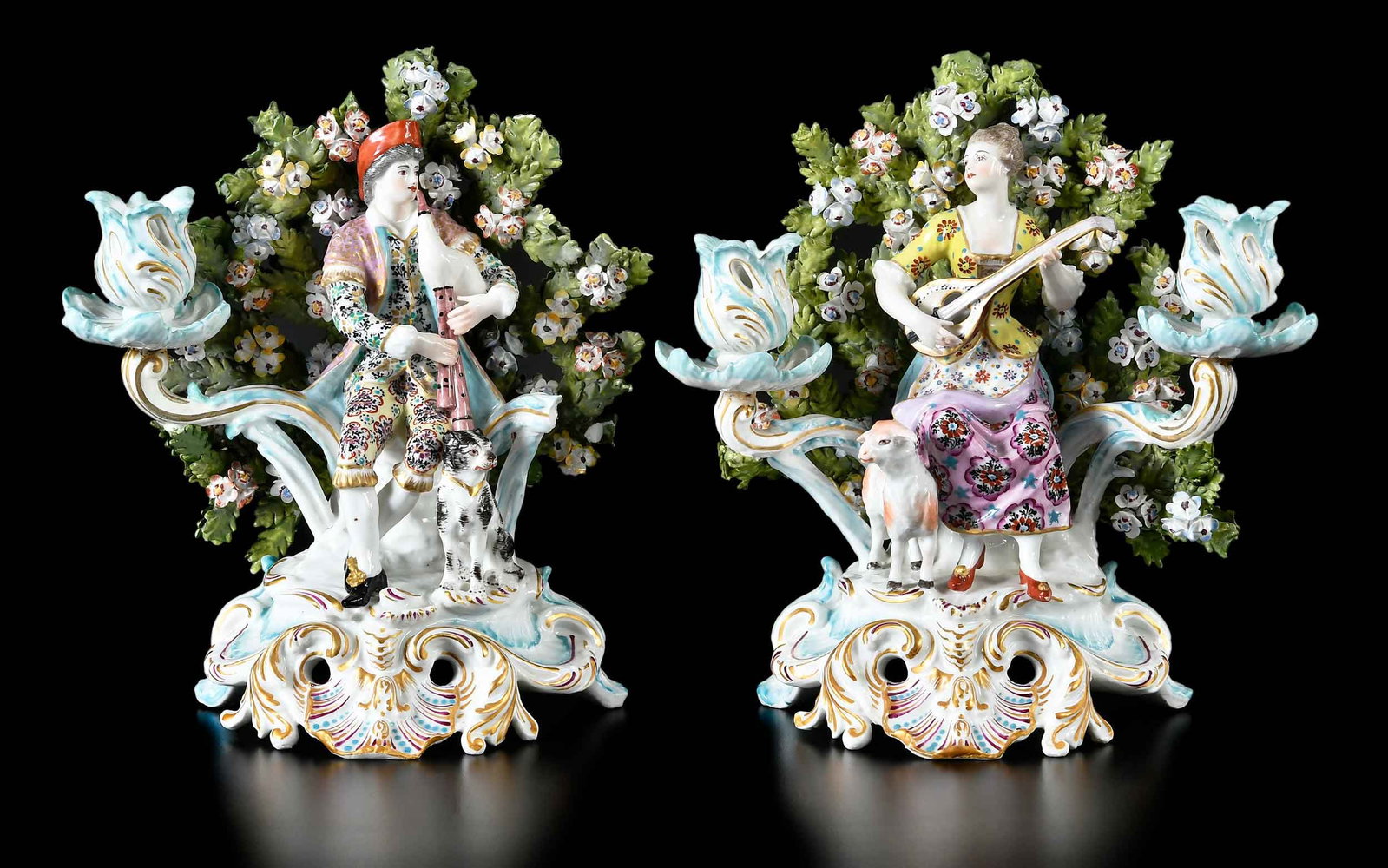 Pair of Chelsea Figural Bocage Porcelain Two Light Candelabra: English, 19th century, gilt anchor marks to bases, featuring male and female figures with instruments, each approx. 9-1/2 x 9-1/2 x 5-3/8 in. Provenance: Private Charlotte Collection