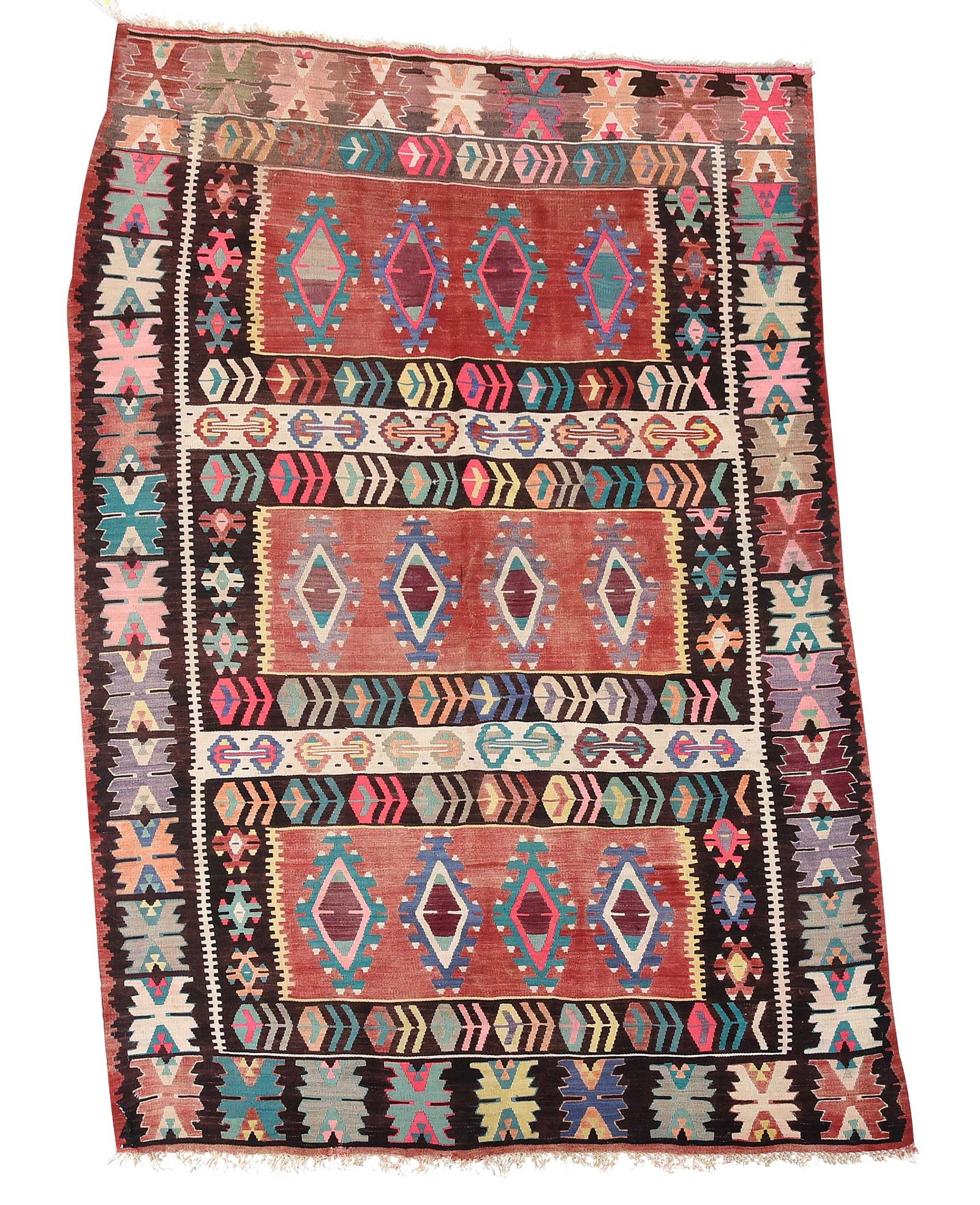 Kilim Carpet: three horizontal rows with repeating diamond medallions, geometric florals, 8 ft. 11 in. x 6 ft. 4 in. Provenance: Private Collection, Asheville, North Carolina