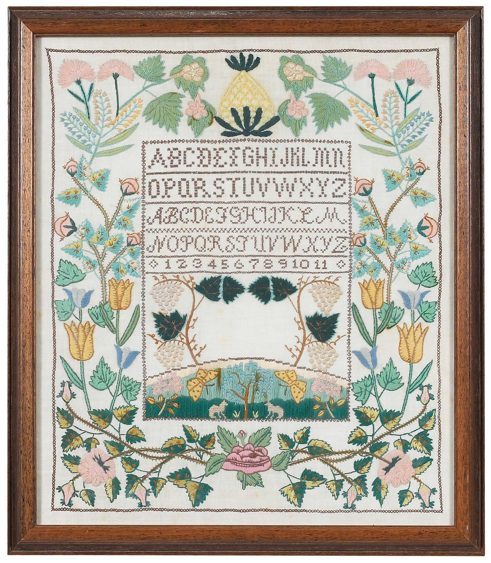 Needlework Sampler with Pineapple Motif: 20th century, crewel wool on linen, sight 22-3/4 x 18-1/2 in.; wood frame, 24-1/2 x 21-1/2 x 1-1/4 in. Provenance: Private Collection