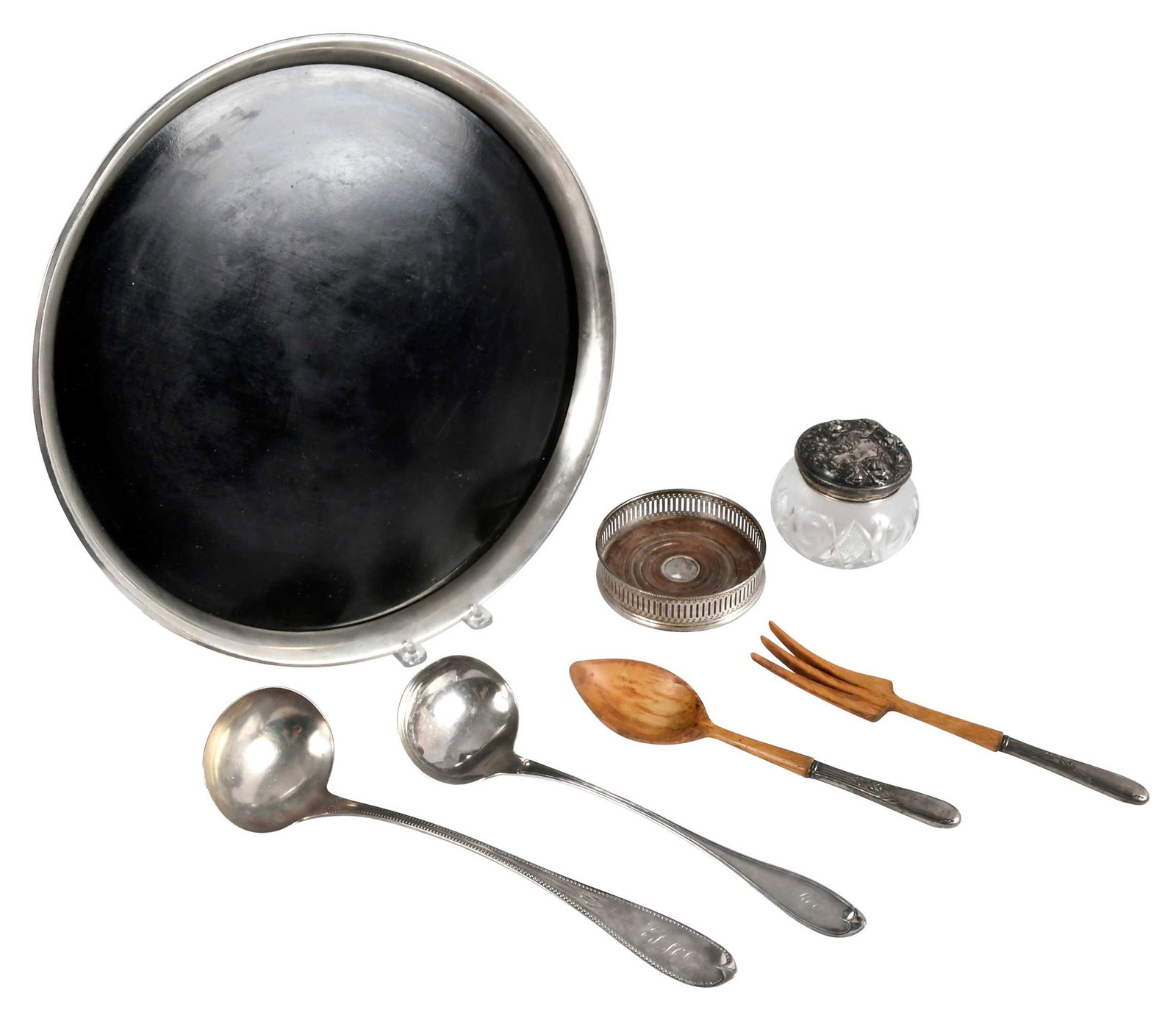 Seven Assorted Silver Table Items: 19th/20th century, English silver coaster with wood base; Gorham tray with sterling flared rim, 16 in.; William Gale coins silver ladle, 5.14 oz. T.; hollow handle salad set with wooden bowls;