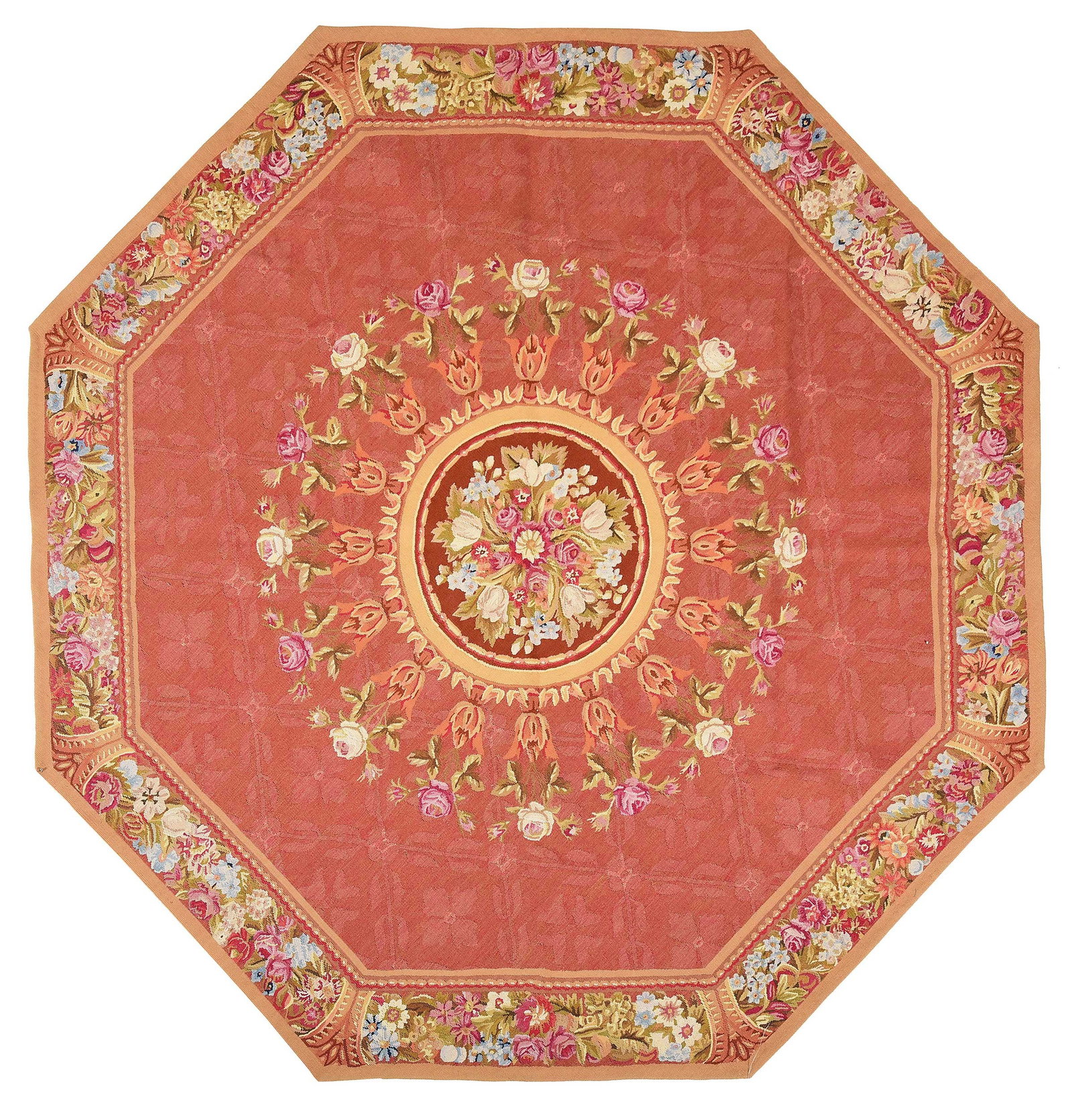 Aubusson Style Octagonal Rug: 20th century, floral decoration on red field, dense floral border, 6 ft. 8 in. x 6 ft. 8 in. Provenance: Private Charlotte Collection