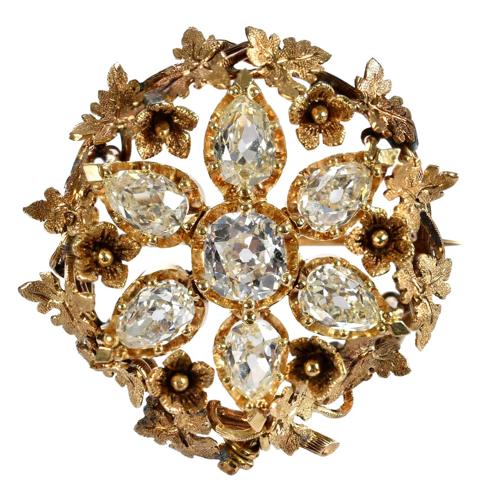 18kt. Diamond Floral Cluster Brooch in Leather Case: old cut diamonds, ranging in sizes, tests 18kt. yellow gold, 30mm diameter, custom case marked "Harvey & Gore ", outside case marked "Katherine Laughton 1, July 1937", 11.0 g P