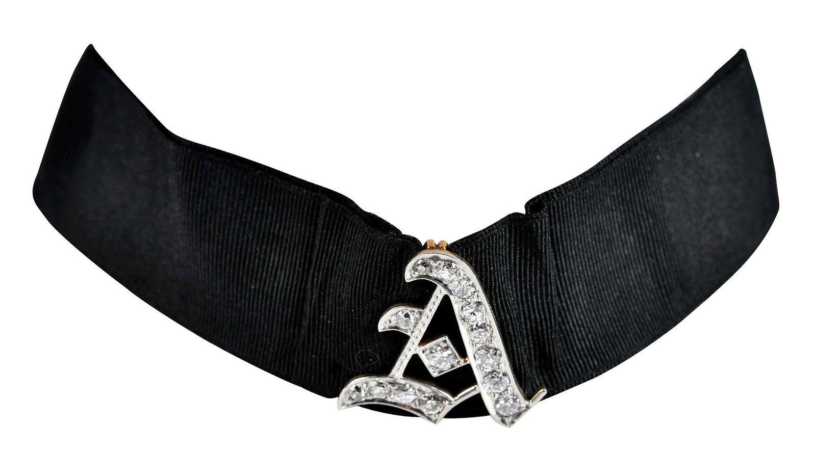 14kt. Vintage Diamond Initial "A" Choker on Black Cloth: old cut diamonds, tests 14kt. white gold, 23.0 x 24.0mm, black satin, clasp marked 14kt. yellow gold, 11-1/2 in. length, 23.0mm wide, 11.8 g Provenance: Private Virginia Collection Note: Accompanied b