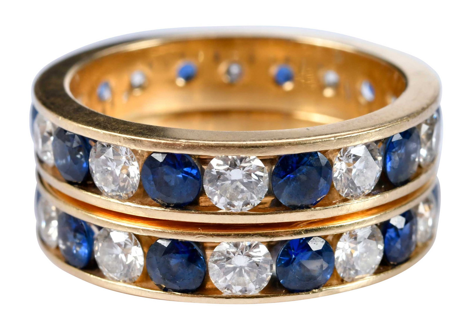 18kt. Two Eternity Bands Diamonds and Blue Sapphire: 20 round full cut diamonds, approx. 4.00ct., VS, G-H, alternating 20 round full cut blue sapphire, approx. 4.00ct., marked "18", yellow gold, 10.0mm wide, 11-1/2 ring sz., weight 15.6 g Provenance: Co