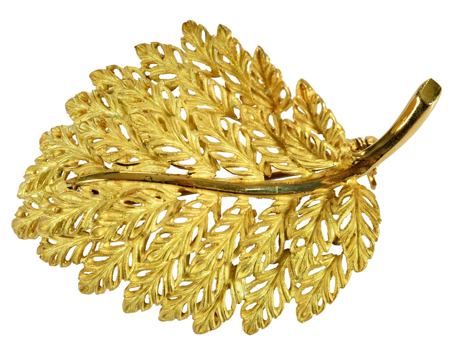 18kt. Textured Satin Finish Leaf Brooch: open work, marked "18Kt, Italy", yellow gold,1-3/4 in. length, 8.9 g Provenance: Private Virginia Collection Note: Brunk Auctions does not guarantee the accuracy of metal content or purity. All refere