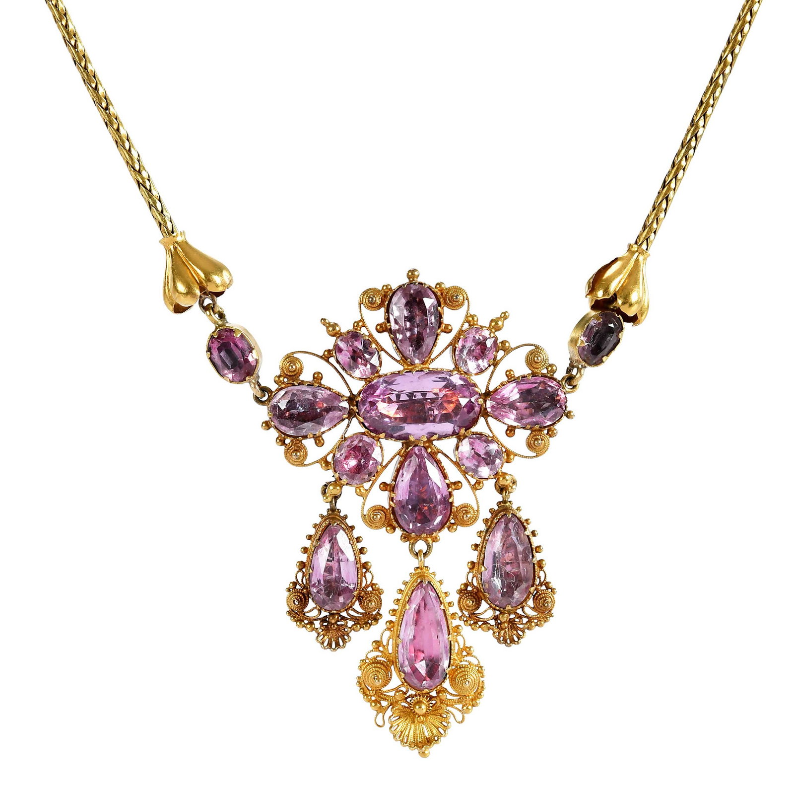 Georgian Pink Topaz Cannetille Pendant Necklace: oval and pear shaped faceted pink topaz, three pear shaped faceted pink topaz drops, intricate filigree, closed back, snake link chain, tests 18kt. yellow gold, 20 in. length, 18.6 g Provenance: Priva