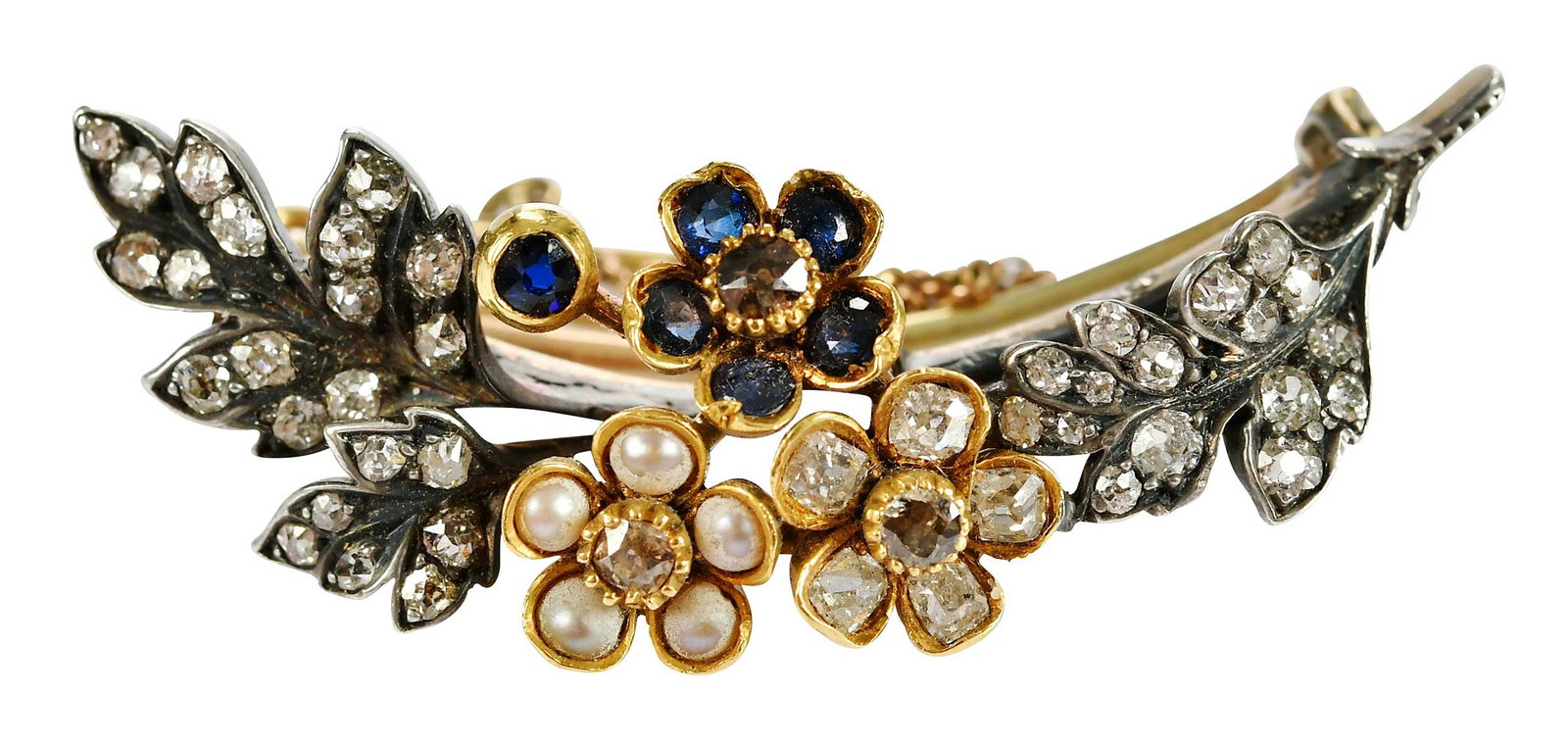Carlo Giuliano Renaissance Revival Floral Spray Brooch: decorated with delicate old cut diamonds, blue sapphires and pearls, signed "CG", for Carlo Giuliano, tests yellow gold paired with silver topped settings, 1-1/2 x 1 in., custom case "C. Giuliano 115 