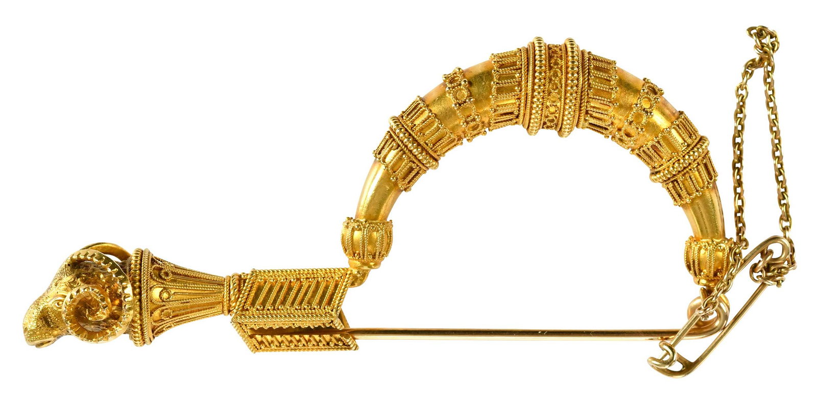 18kt. Classic Etruscan Revival Ram's Head Fibula: inspired archaeological design, ram head finial, tests 18kt. yellow gold, 3 x 1-1/4 in., 16.2 g Provenance: Private Virginia Collection Note: Brunk Auctions does not guarantee the accuracy of metal co
