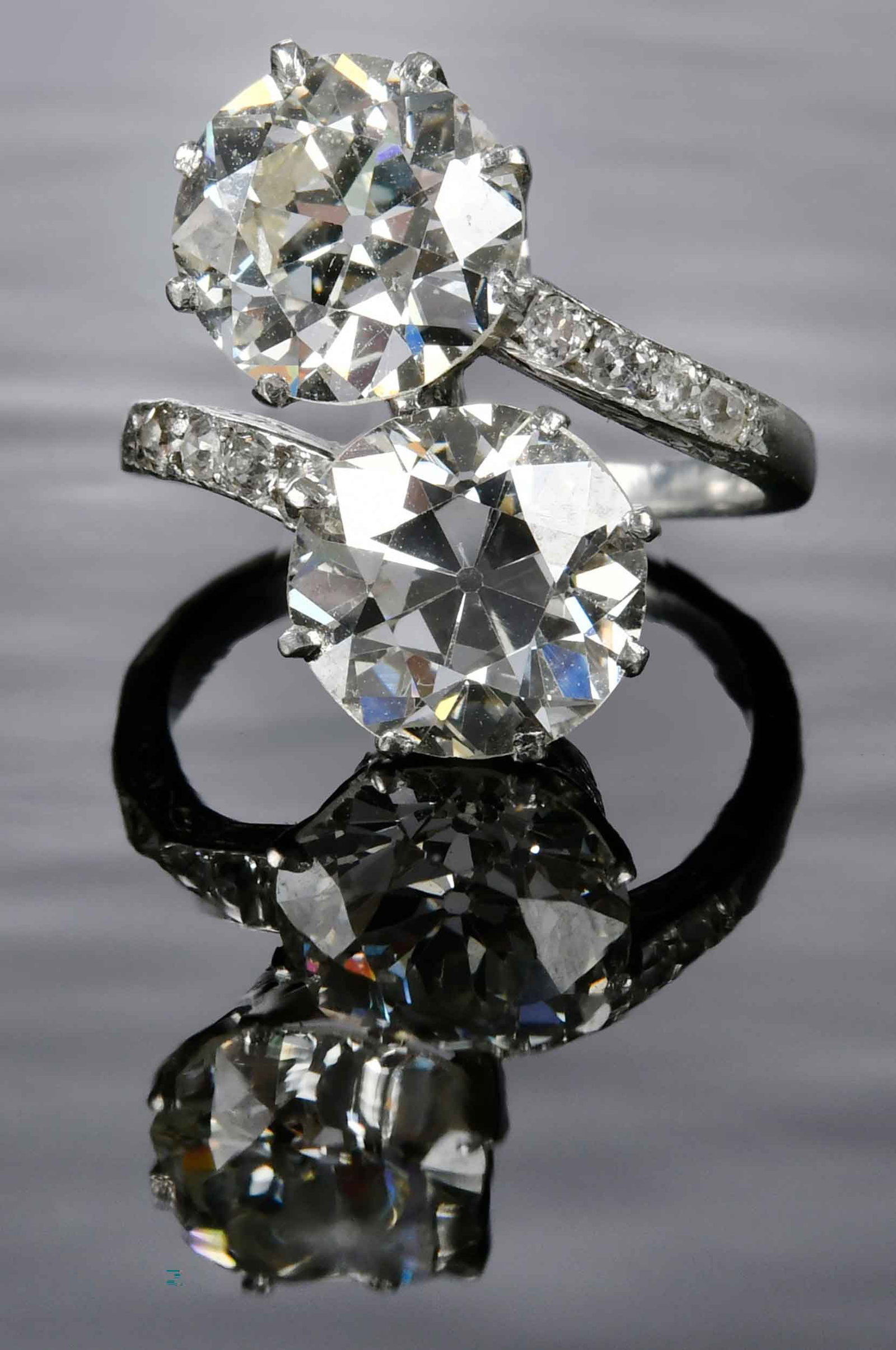 Platinum Toi et Moi Vintage Diamond Ring - GIA: two old European cut diamonds, GIA 5242010056, 2.53ct., VS1, L, GIA 6247010031, 2.27ct., VS2, L, flanked by eight old mine cut diamonds, tests platinum, 3-1/2 ring sz., 4.0 g Provenance: Private Virgi