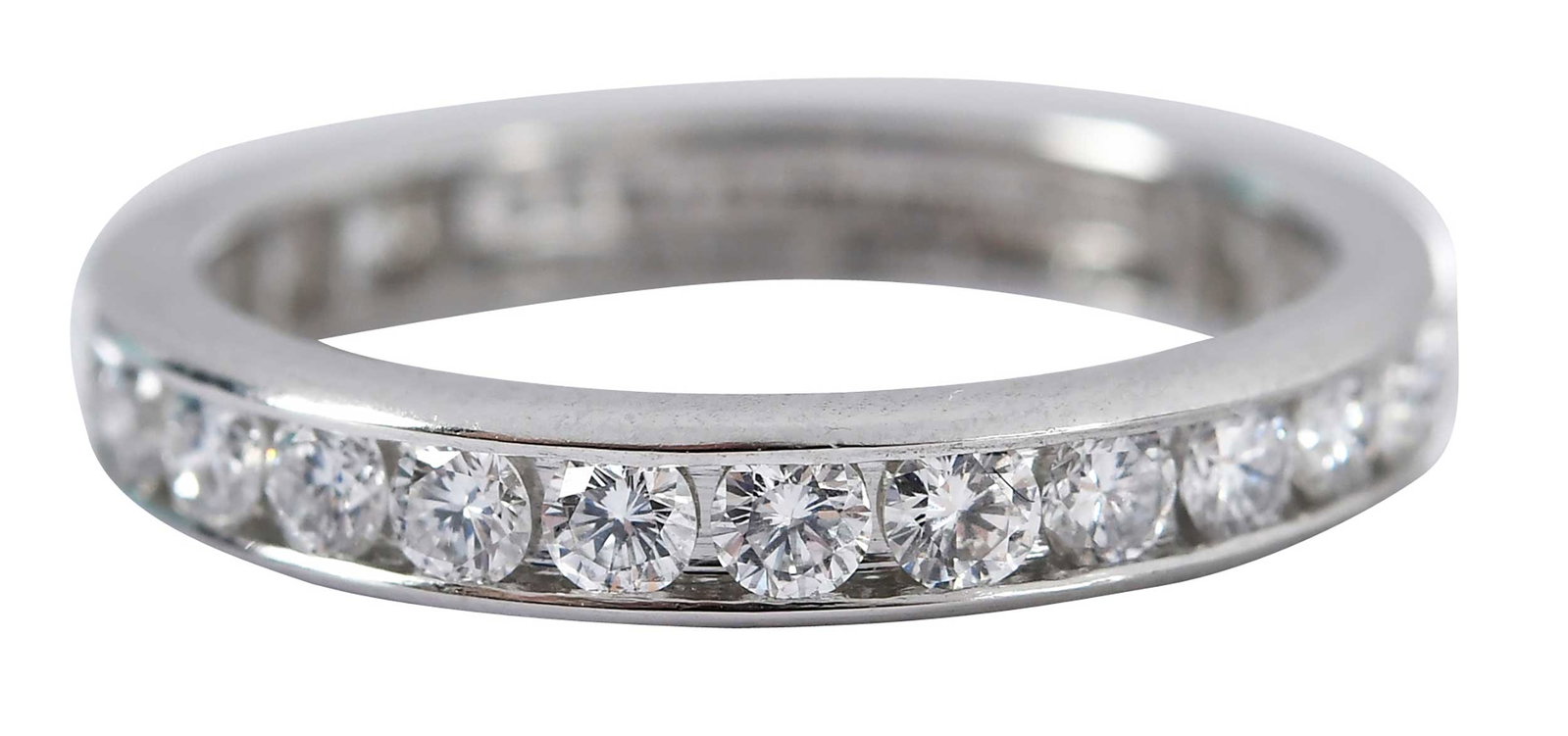 Platinum Tiffany & Co. Diamond Eternity Band: single row round full cut diamonds, marked "950 Tiffany & Co", platinum, 5-1/2 ring sz, 3.0mm, 3.7 g Provenance: Private Virginia Collection Note: Brunk Auctions makes no warranty or guarantee regardi