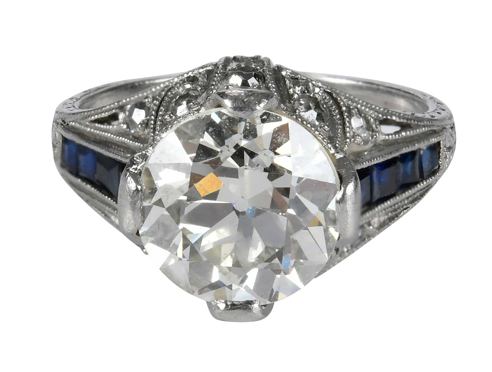 Platinum Art Deco Diamond and Blue Sapphire Ring - GIA: old European cut diamond, GIA 2245010066, 2.12ct., VS1, N, eight square step cut blue sapphires, tests platinum, 3-1/4 ring sz., 3.0 g Provenance: Private Virginia Collection Note: Brunk Auctions make