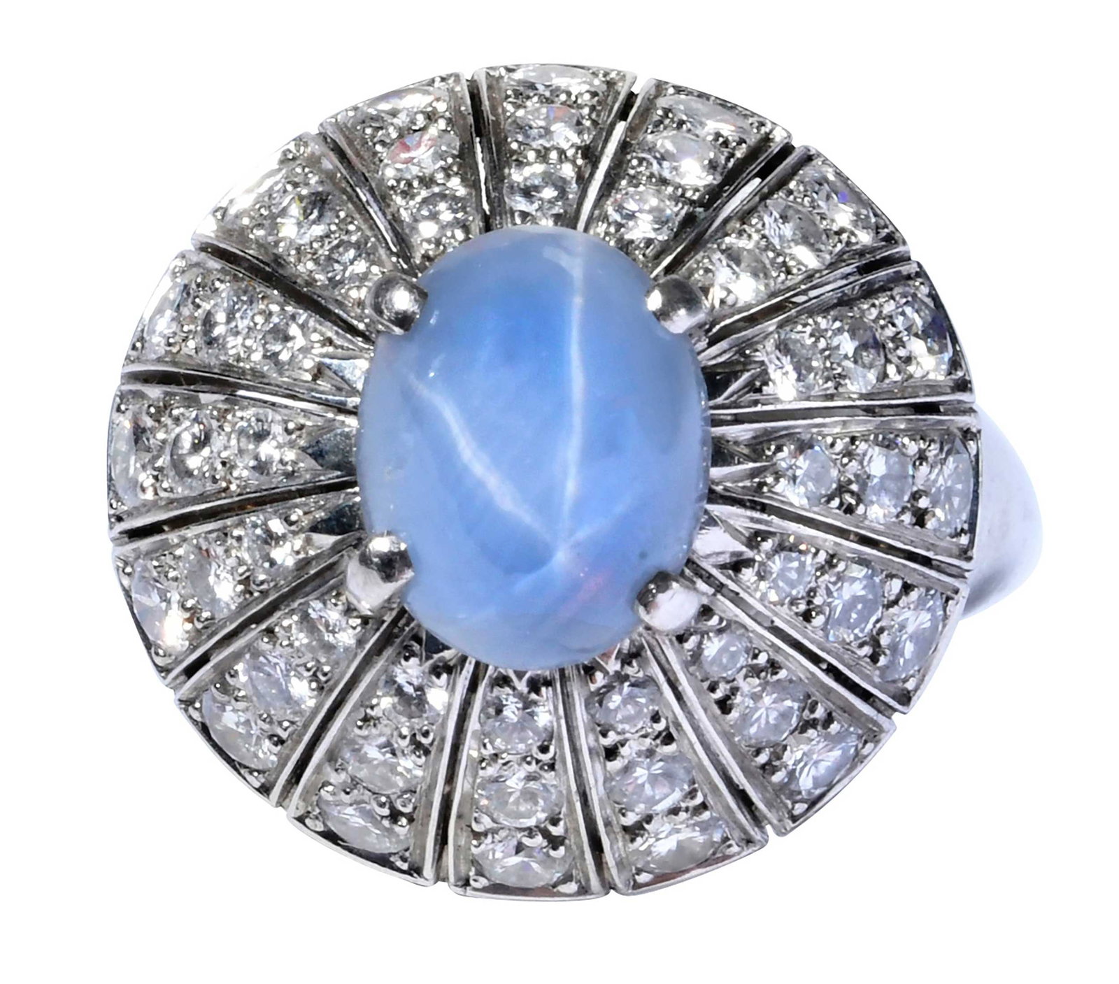 Platinum Star Sapphire and Diamond Ring: oval cabochon light blue star sapphire, round full cut diamonds, approx. 0.80ctw., tests platinum, 7-1/2 ring sz. with sizer, 13.2 g Provenance: Private Collection Note: Brunk Auctions makes no warran