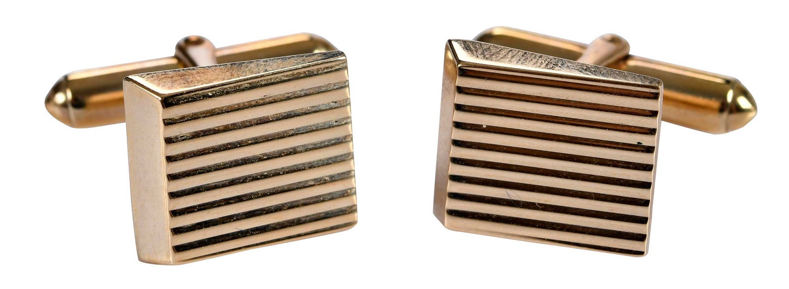 14kt. Tiffany & Co. Gold Cufflinks: two ribbed textured, high polish finish, marked "14K. Tiffany & Co" yellow gold, 14.6 x 12.6mm, T bar backings, 13.6 g, original Tiffany & Co. box Provenance: Private Virginia Collection Note: Brunk A