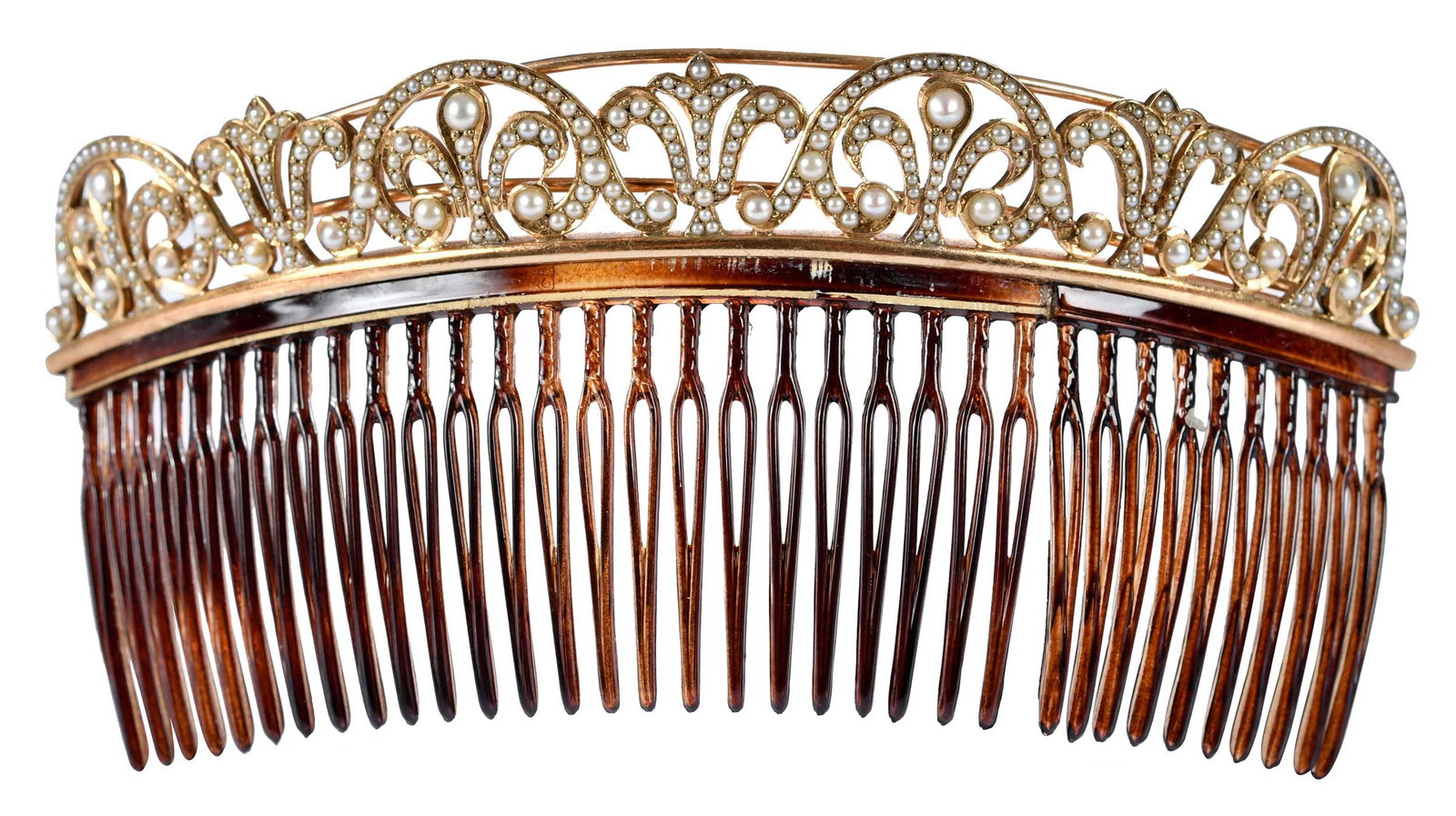 14kt. Ladies Regency Style Hair Comb Embellished with Pearls: seed pearls, graduating is size, marked "14K, Made In France", yellow gold, curved design with barrette, 5 x 2-7/8 in., 26.0 g Provenance: Private Collection, Asheville, North Carolina Note: Brunk Auc