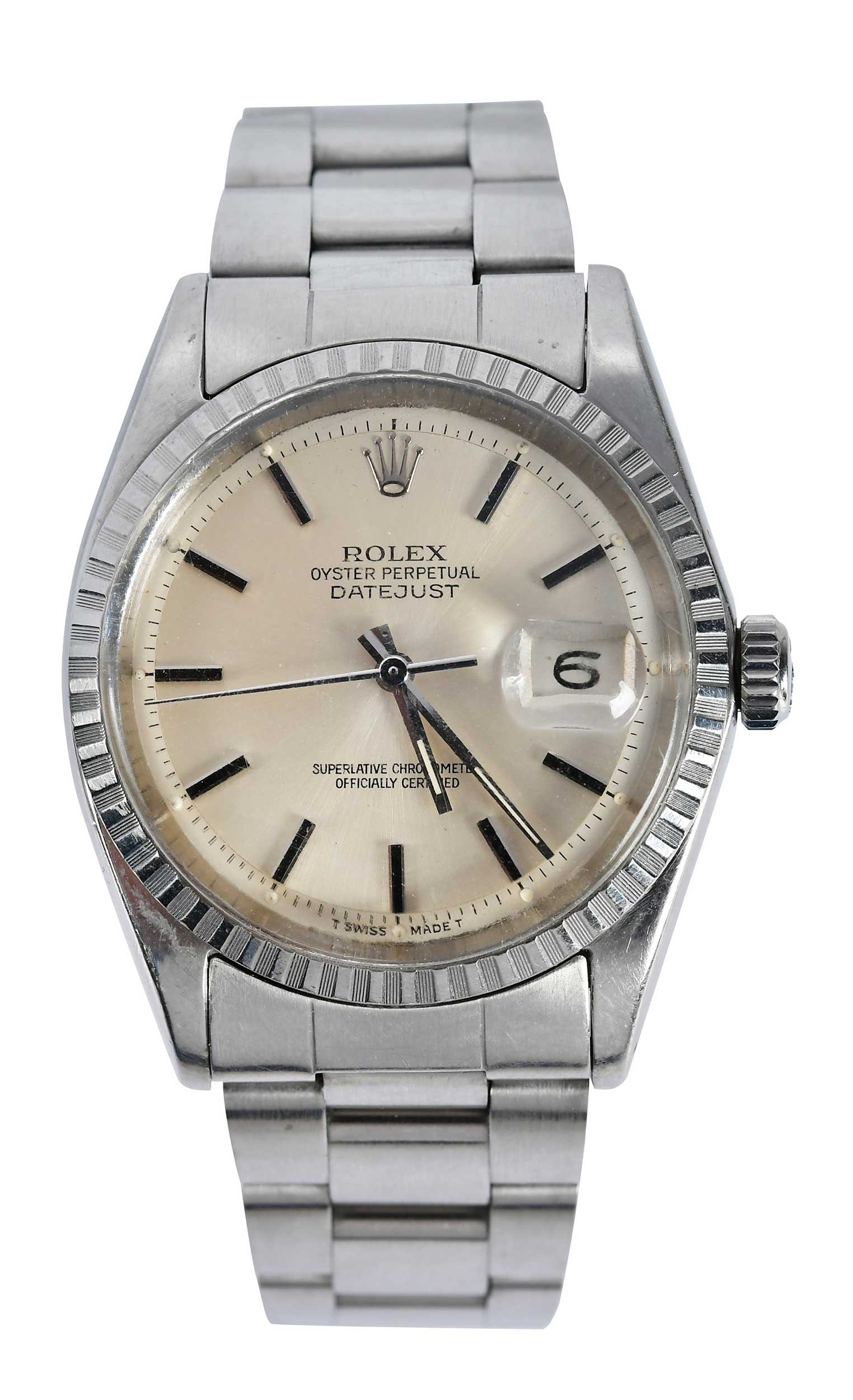 Stainless Steel Rolex Oyster Perpetual Datejust Watch, Paperwork and Service Box: fluted bezel, baton numeral hour markers, marked "580", stainless steel, model 876539, movement 1570, Oyster bracelet, stainless steel, inside measurement 8 in., adjustable length, total weight 97.3 g