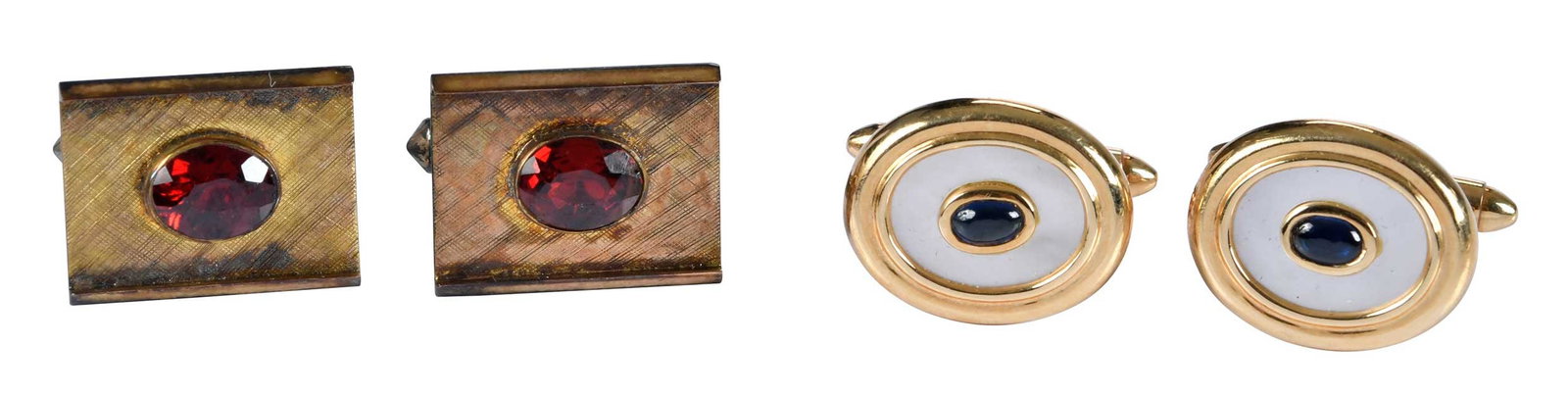 Two Pairs of Gold Cufflinks, MOP, Blue Sapphire and Garnets: two oval cabochon cut blue sapphires, mother of pearl, marked "MJC, 14K", yellow gold, 19.0 x 15.0mm, T bar backings, 11.5 g; two oval faceted garnets, florentine finish, marked "10kt", yellow gold, 1