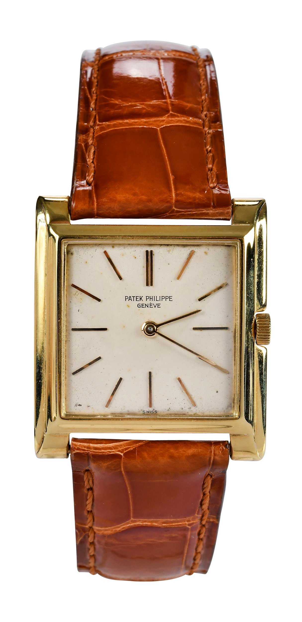 18kt. Patek Philippe Mid Century Dress Watch with Leather Band: circa 1955, approx. 28 x 32mm, stepped bezel, baton hour markers, acrylic crystal, manually wound movement, marked "18K, 750", yellow gold, reference 2562, movement 855625, tan alligator leather band,