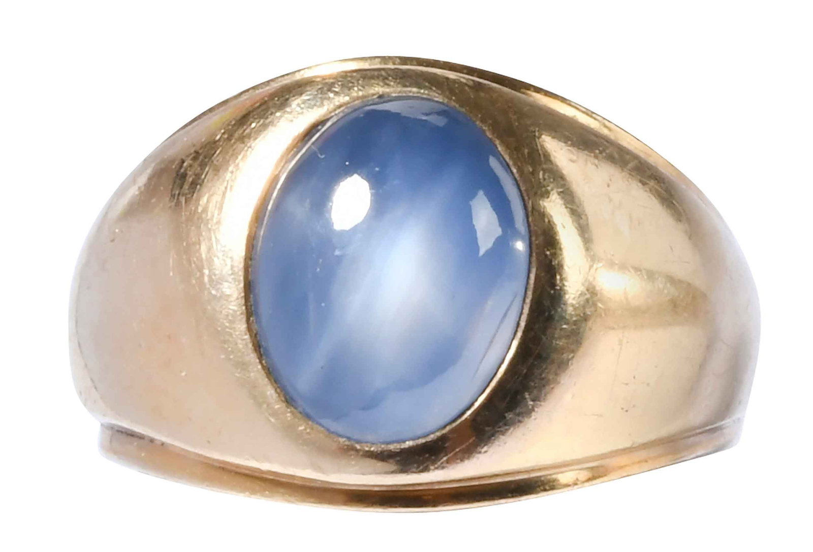 14kt. Blue Star Sapphire Ring: oval cabochon blue star sapphire, approx. 9.00ct., marked "14K", yellow gold, 9-1/2 ring sz., 13.3 g Provenance: Private Collection Note: Accompanied by an appraisal report dated October 7, 2025. Brun