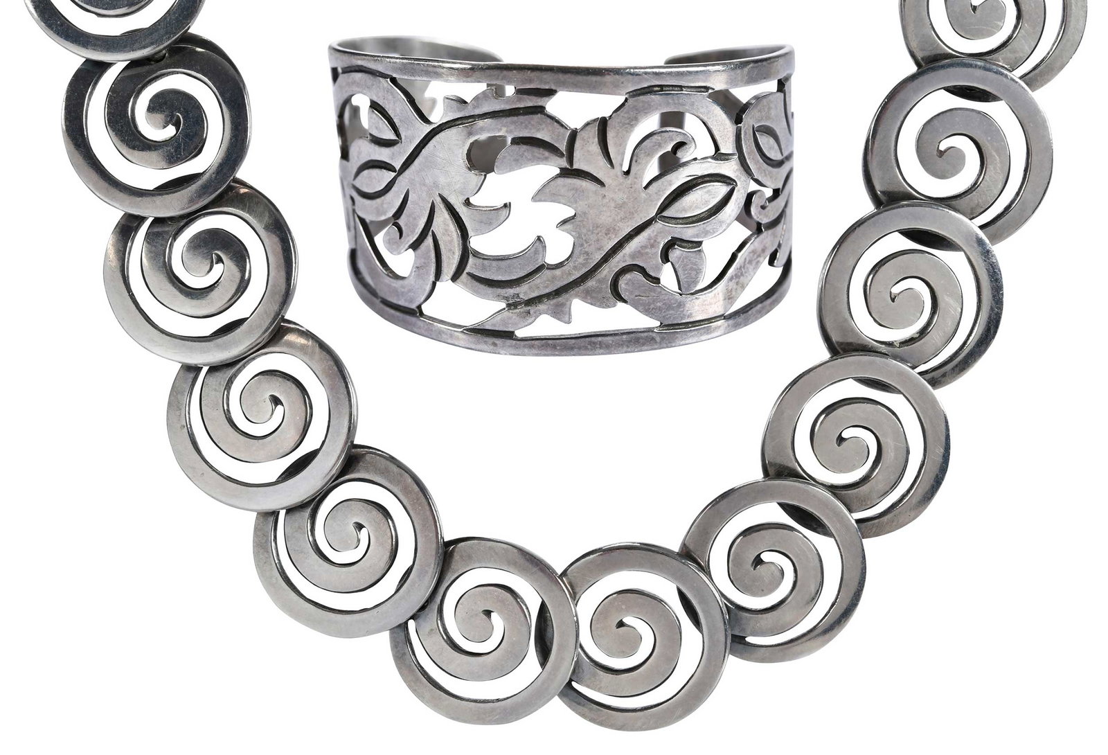 Two Vintage Taxco Silver, Bracelet and Necklace: comprising: high polish, pierced cuff, marked "925 Mexico, Texco", signed William Spratling, bracelet 5-3/4 in. inside measurement, 36.0mm widest area; spiral links, marked "925 Mexico, JLF, Texco", s