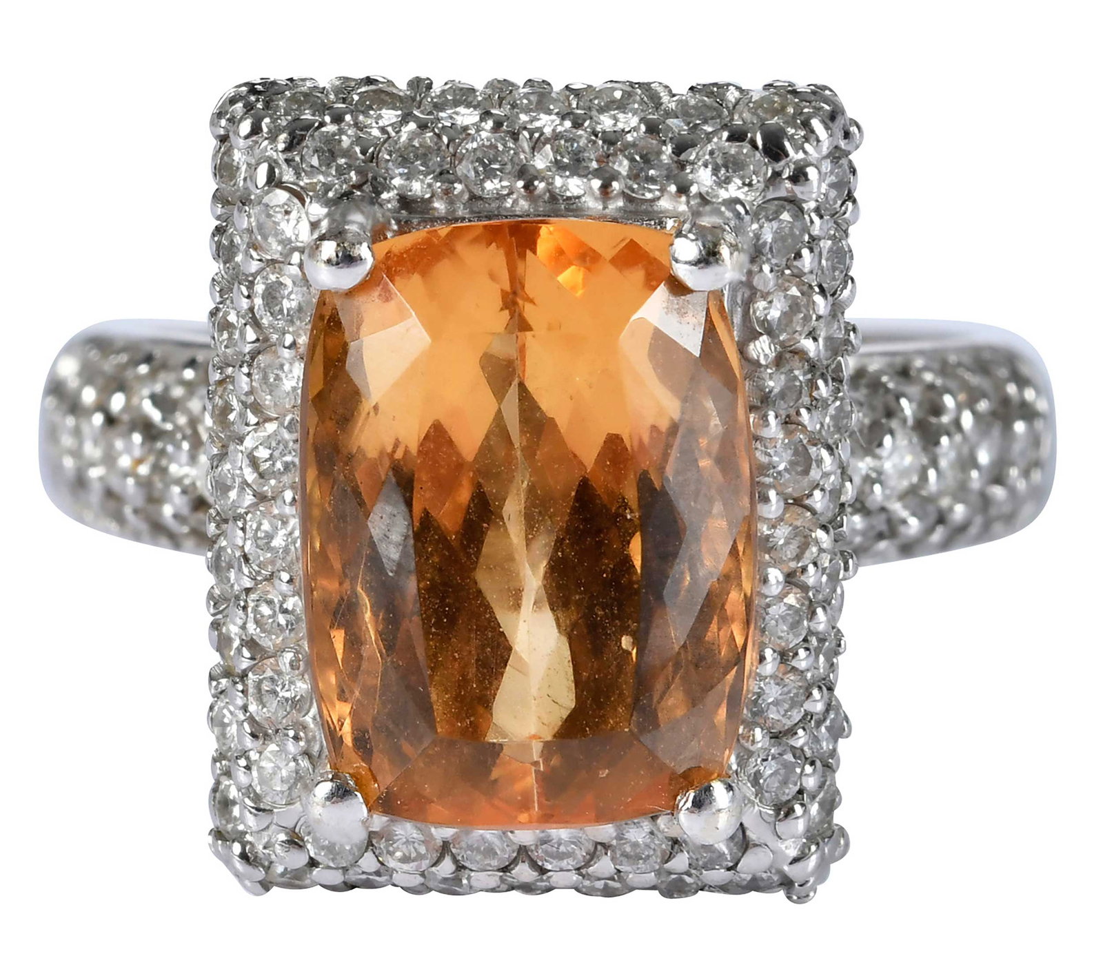 18kt. Topaz and Diamond Halo Ring: radiant faceted topaz, approx. 12.0 x 9.0mm, round faceted diamonds, marked "18k", white gold, 8-1/4 ring sz., 12.5 g Provenance: Private Collection, Virginia Beach Note: Brunk Auctions makes no warra
