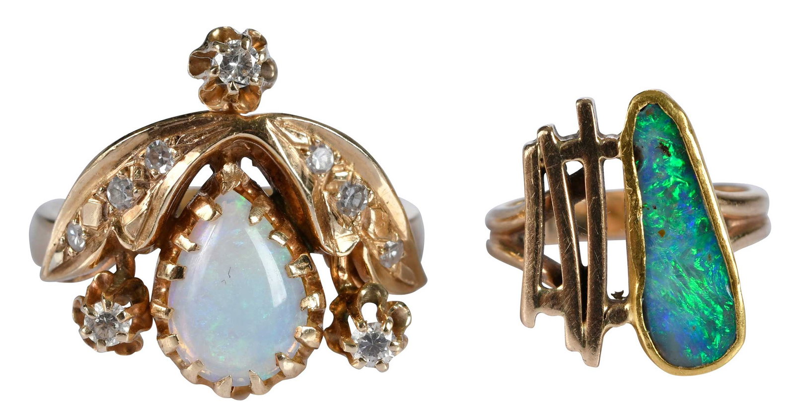 14kt. Two Fashion Opal Rings: opal free form, marked "14K", yellow gold, 3-1/2 ring sz., 4.9 g; pear cabochon cut opal, round full and single cut diamond accents, marked "14K", yellow gold, 7 ring sz., 6.4 g Provenance: Private Co