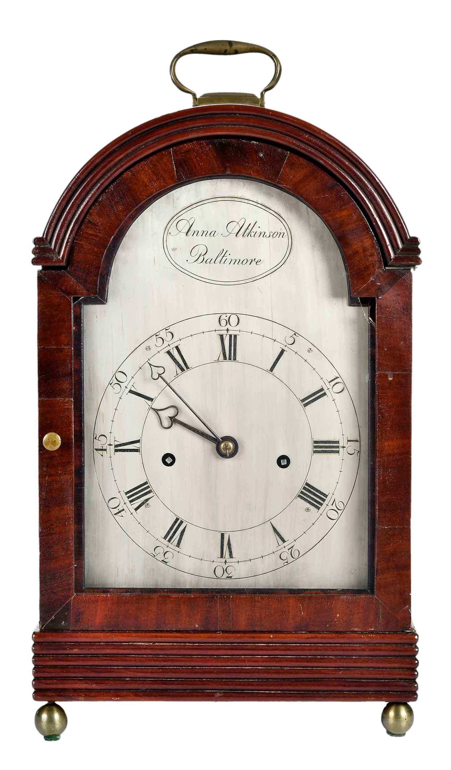 Exceptional Baltimore Federal Bracket Clock by a Female Maker: circa 1796-1815, thought to be the earliest American clock by a female maker, the silvered dial signed "Anna Atkinson, Baltimore", arched mahogany case with reeded molding typical of the Baltimore