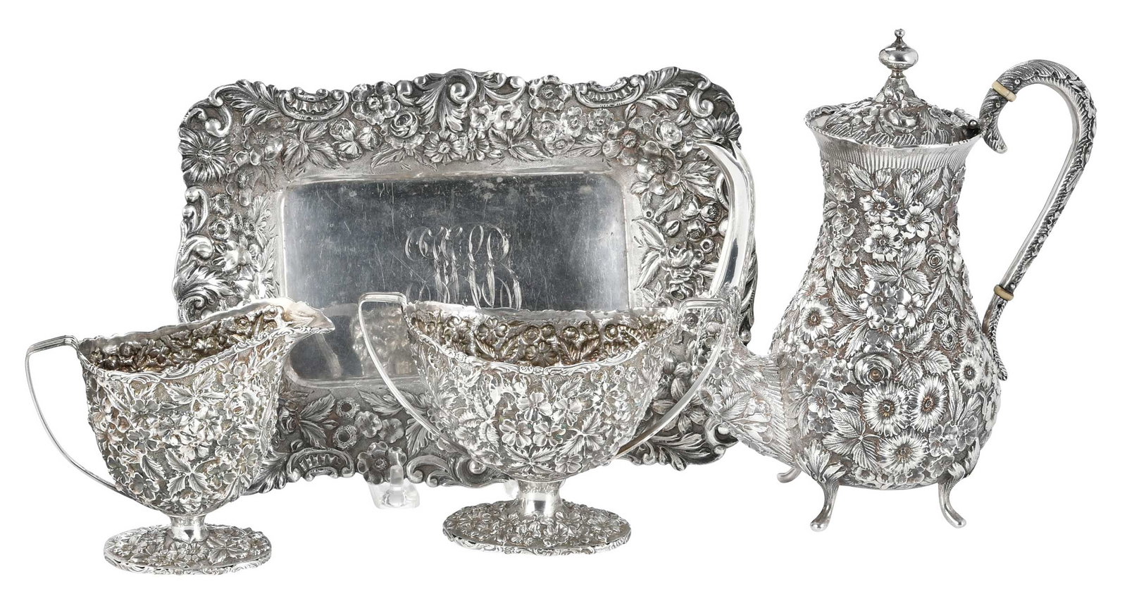 Four Pieces Baltimore Sterling Repousse, Shippen Family Provenance: Maryland, 19th/20th century, floral repousse decoration, including three piece individual coffee, ivory spacers, marks for James R. Armiger (Baltimore, Maryland, working 1866-1896), 8-1/2 in. coffee p