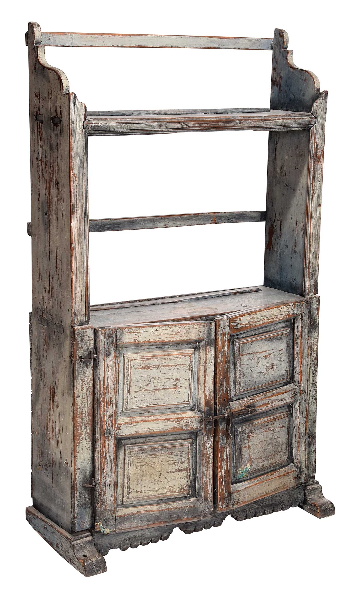 Early Diminutive Paneled and Blue Painted Pewter Cupboard: 18th century, distressed pale blue paint, through tenon construction, pine secondary, two paneled doors with wrought hinges and latch, scalloped skirt and sled feet, 55 x 33 x 12-1/2 in. Provenance: