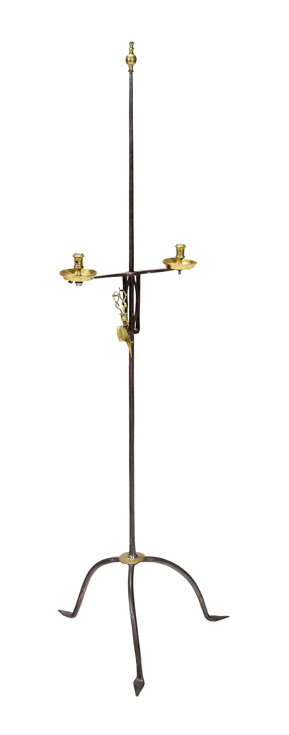American Wrought Iron and Brass Adjustable Two Light Floor Candlestand: 18th century, brass elements including finial and disc to tripod base, accompanied by period appropriate wick trimmers, 58-1/2 x 17 x 17 in. Provenance: Florene Maine Antiques, Ridgefield,