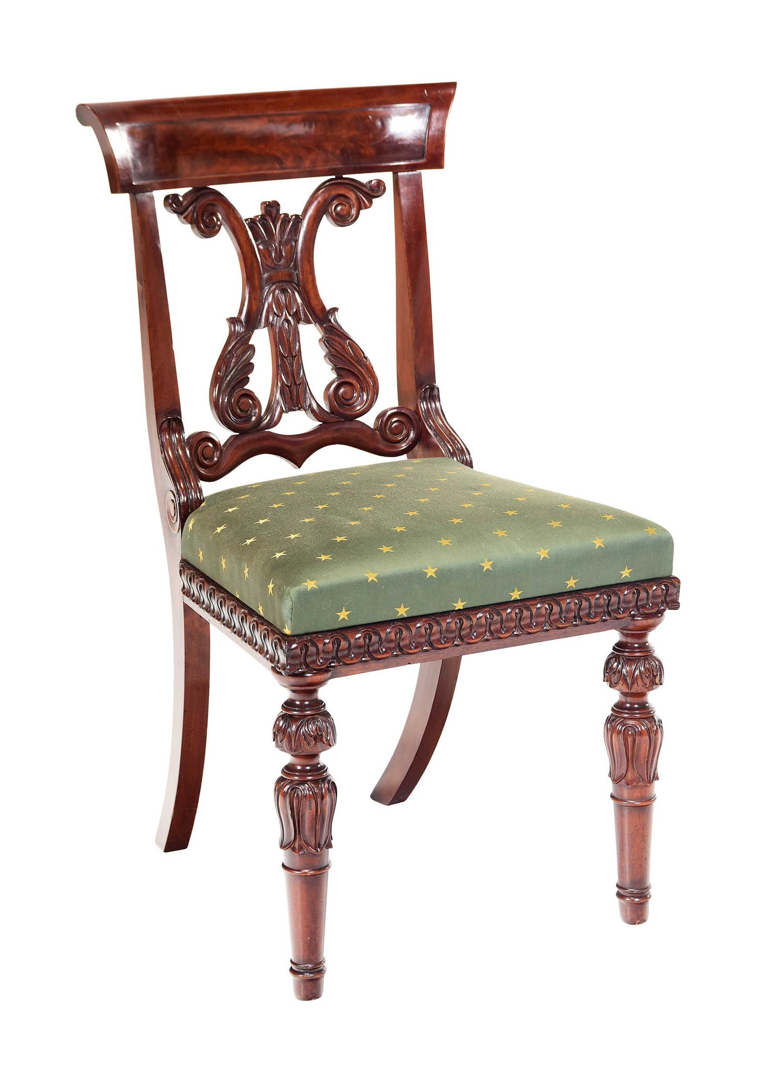 Boston Classical Carved and Figured Mahogany Lyre Back Side Chair: Massachusetts, 1820-1835, scrolled tablet crest, egg-and-dart seat rail, turned front legs with acanthus and lotus leaf carving, 34-1/4 x 19 x 20 in; seat height 18 in Provenance: Private Collection