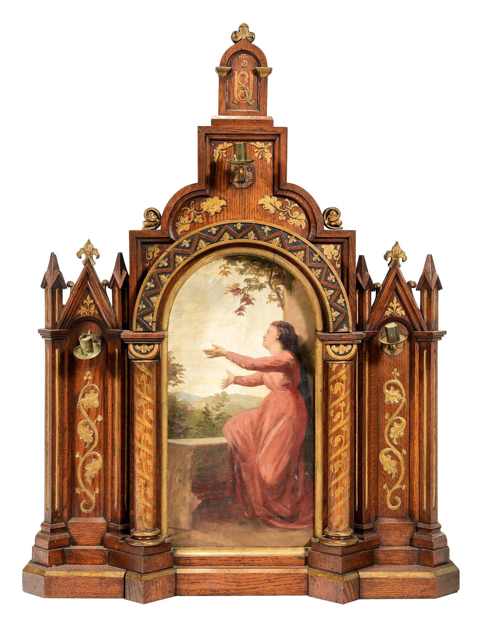 British or American Gothic Revival Table Altar: (19th century) Carved and parcel gilt and painted oak tabernacle type or aedicular altarpiece, inset with painting of a woman, possibly representing a Saint, oil on canvas, with three brass candle
