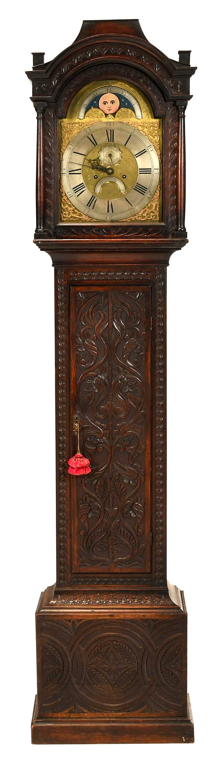 Georgian Carved Oak Tall Case Clock, William Presbury of Coventry: British, second half 18th century, brass dial with moonphase, second feature, and date wheel, inscribed "Presbury / Coventry", bonnet and case with relief carvings throughout, two weights included,