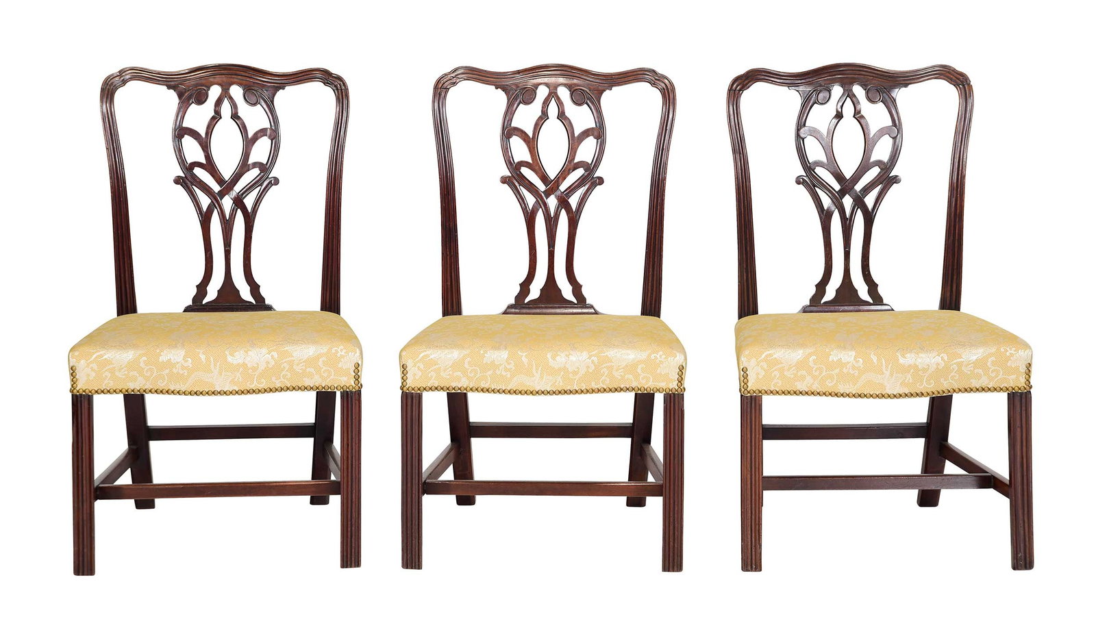 Set Six George III Carved Mahogany Dining Chairs: British, 18th century, interlaced pierced splats, Marlborough legs, brass tacked over the rail chinoiserie motif upholstery, 37-3/4 x 22-1/2 x 23 in., seat heights 18-1/2 in. Provenance: G. Sergeant