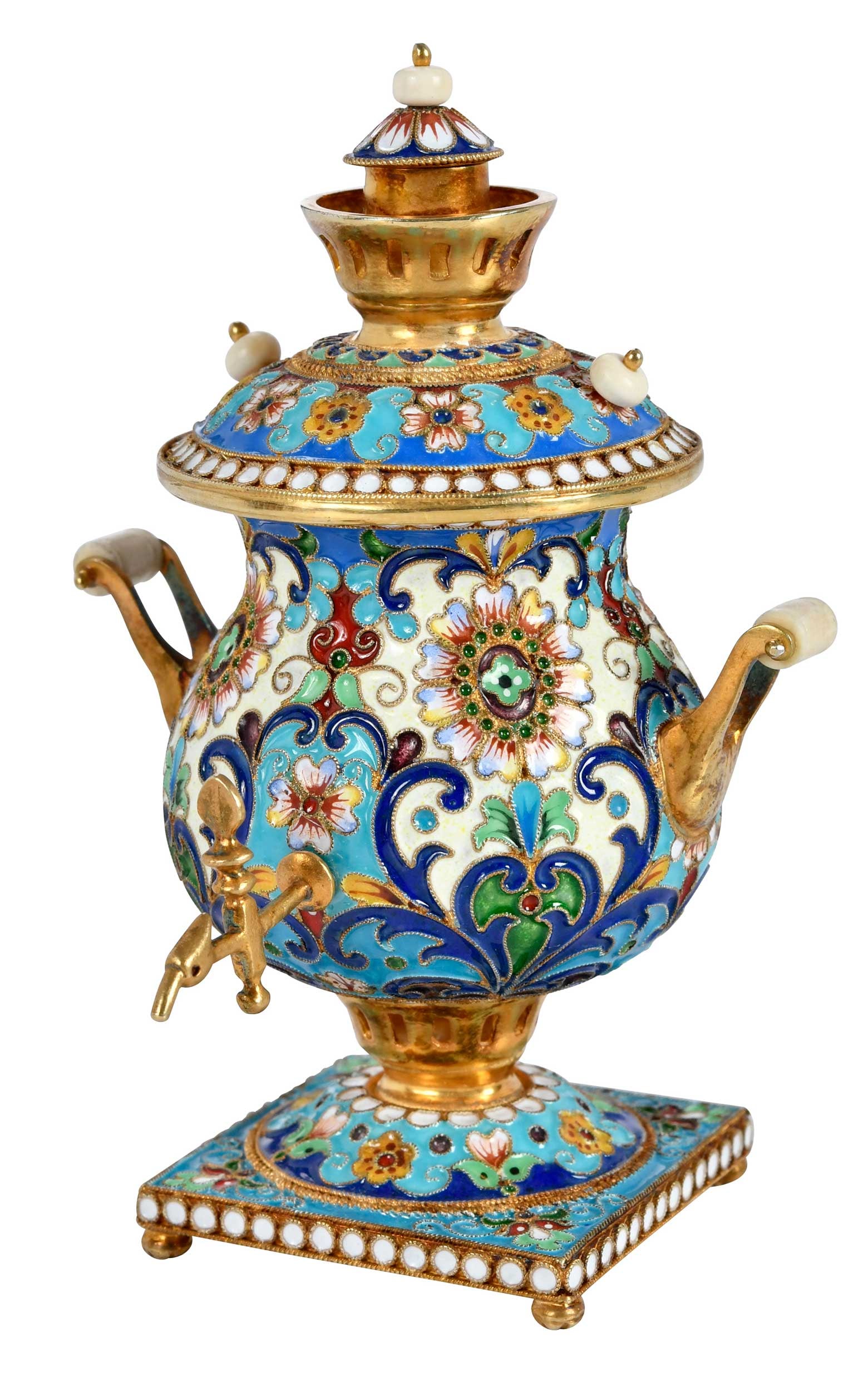 Russian Enameled and Gilt Silver Miniature Samovar: 20th century, urn form, floral enamel decoration, ivory handle and beads, marked "84", probably Russian, test .980 fine (with XRF), 3-3/4 x 2-3/4 x 2-3/4 in. Provenance: Collection of Steve Stewart,