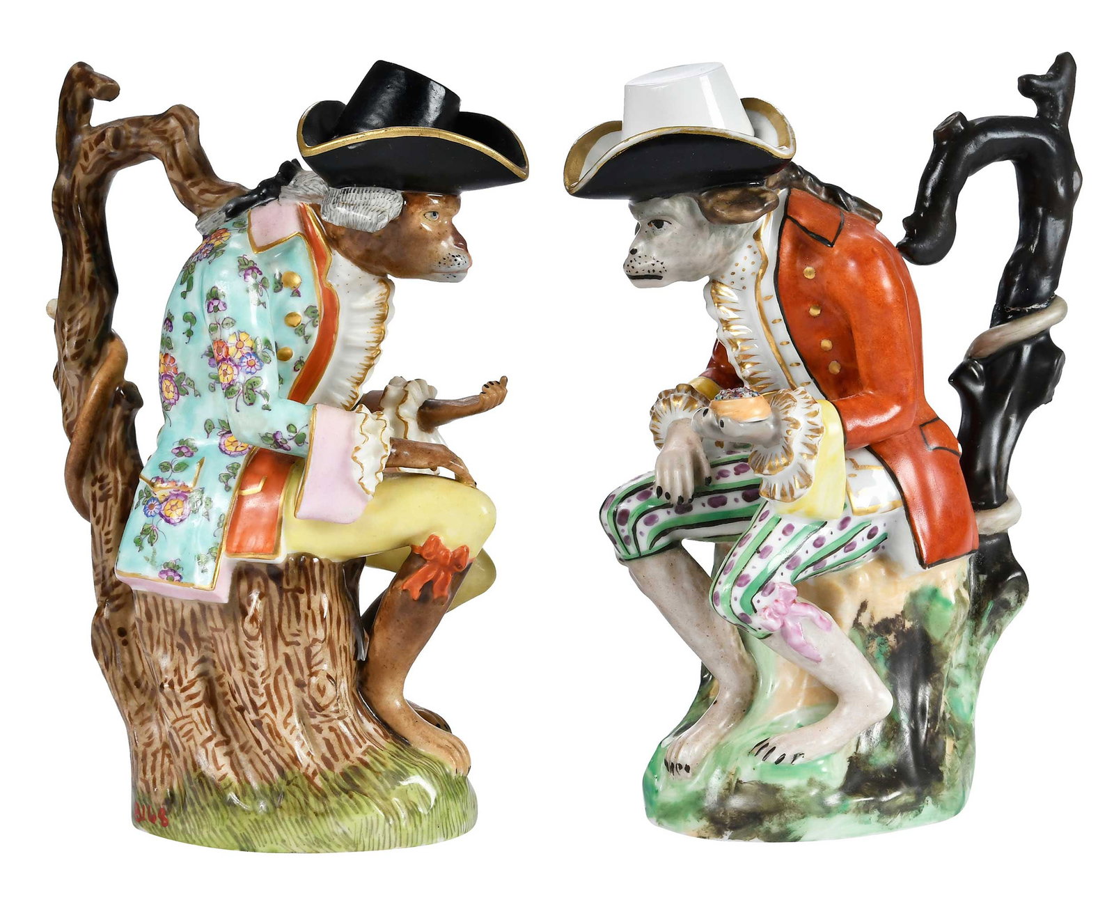 Near Pair of Jacob Petit Porcelain Monkey Pitchers: French, 19th century, one marked "J.P." to base, one with crossed swords, 9 x 3-1/4 x 5-1/4 in. Provenance: Collection of Steve Stewart, Lake Lure, North Carolina