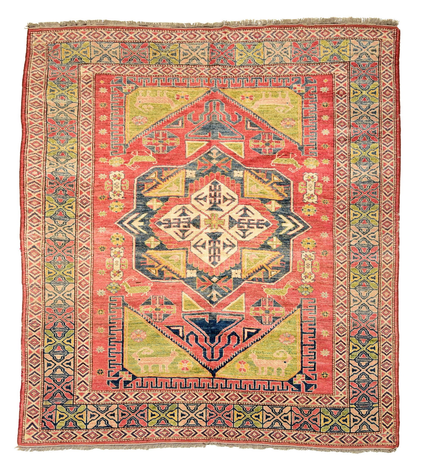 Kazak Rug: 20th century, central polygonal medallion with red field and geometric designs, quadrupeds, 6 ft. 5 in. x 7 ft. 4 in. 