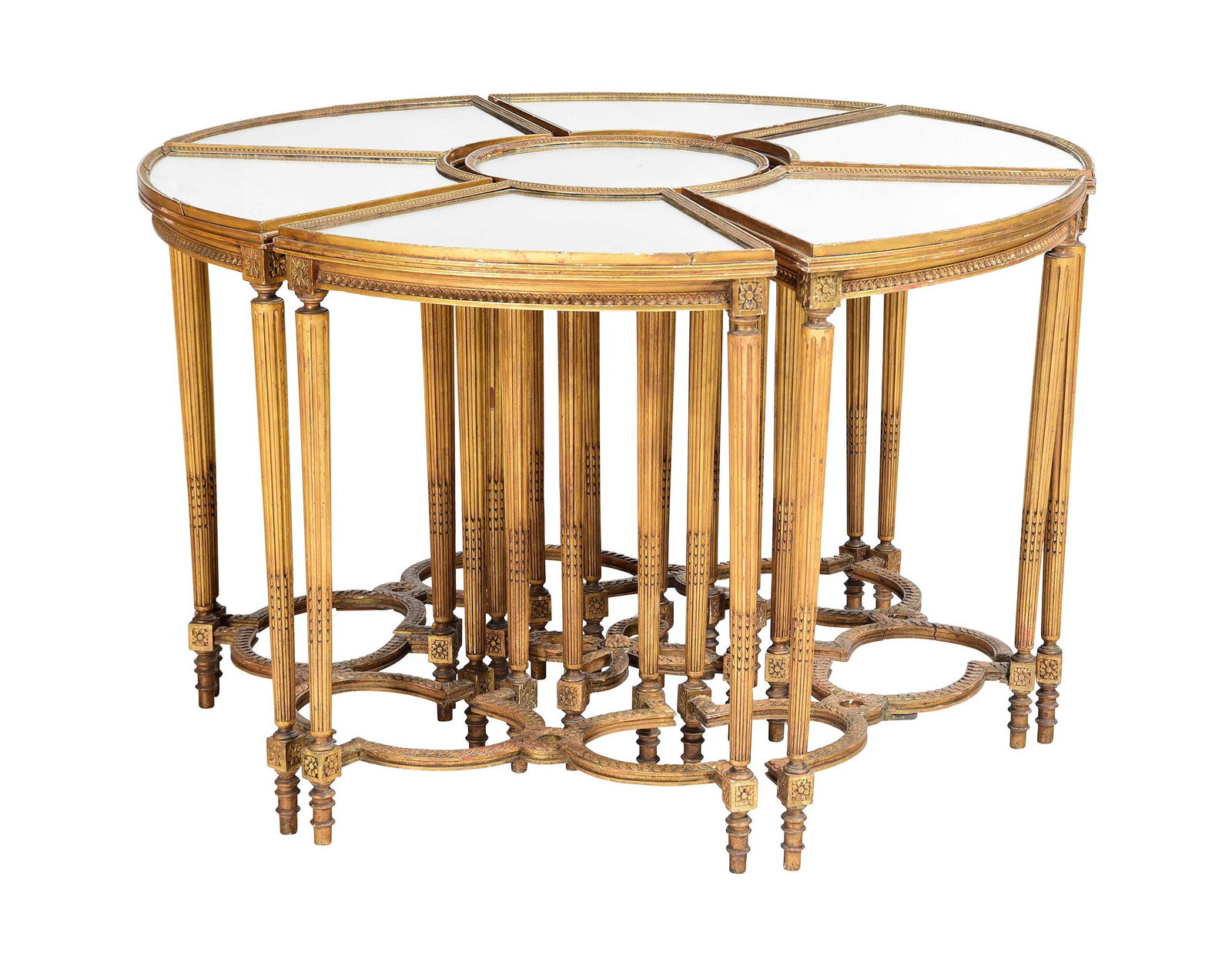 Louis XVI Style Giltwood Mirrored Top Table Suite: first half 20th century, comprising central round table and six semicircular surrounding tables, all with mirrored tops and stretcher bases, central table 30-1/4 x 15-3/4 x 15-3/4 in., semicircular