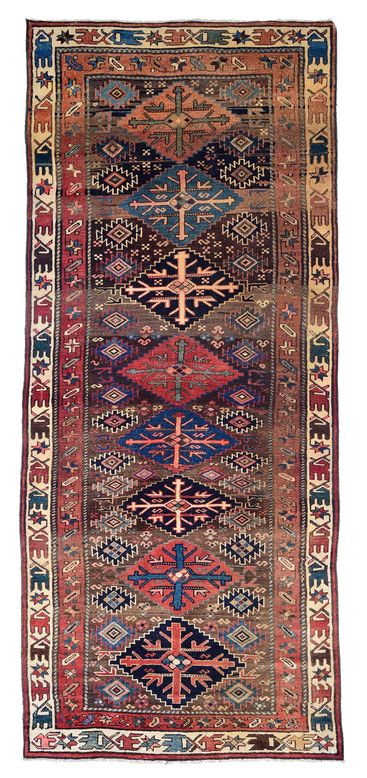 Kazak Runner: early 20th century, eight central medallions with stepped edges, brown field, rust and white borders with star, leaf designs and quadrupeds, 9 ft. 11 in. x 3 ft. 10 in. 