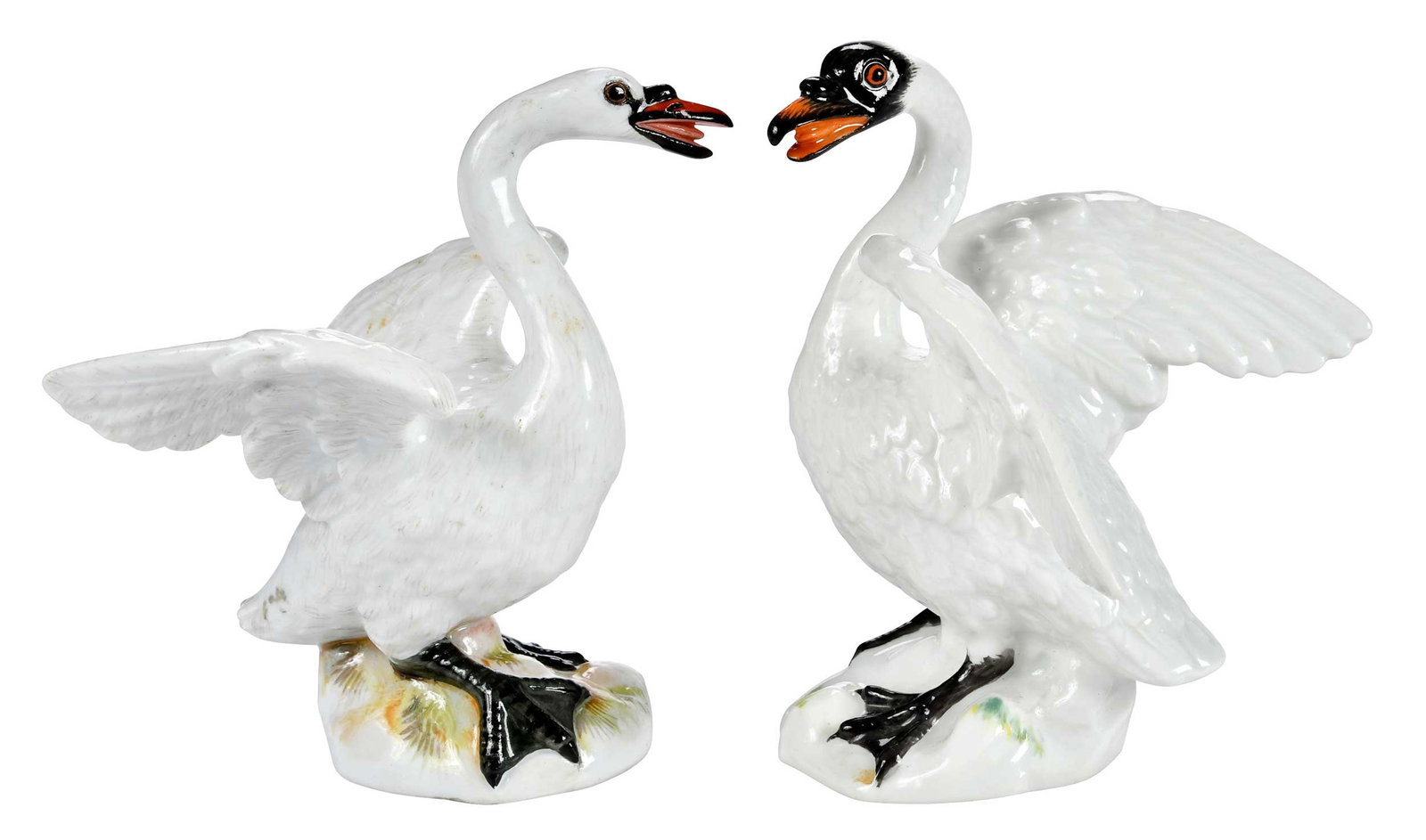 Two Meissen Porcelain Swan Figures: German, late 19th/early 20th century, each with crossed swords and "2213" to base, each approx. 4 x 3-1/8 x 3-1/4 in. Provenance: Collection of Steve Stewart, Lake Lure, North Carolina