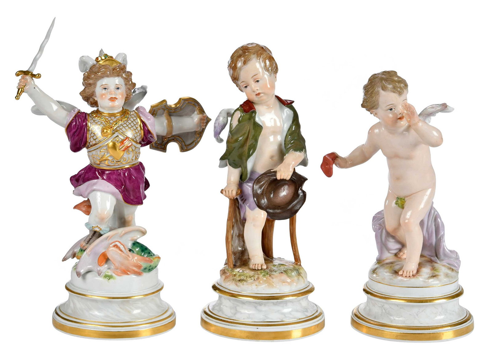 Three Meissen Porcelain Putti Figurines: German, late 19th/early 20th century, one as Saint George, one as a beggar, and one with a red mask, after the models by Henrich Schwabe, crossed swords marks to bases, impressed model numbers L110,
