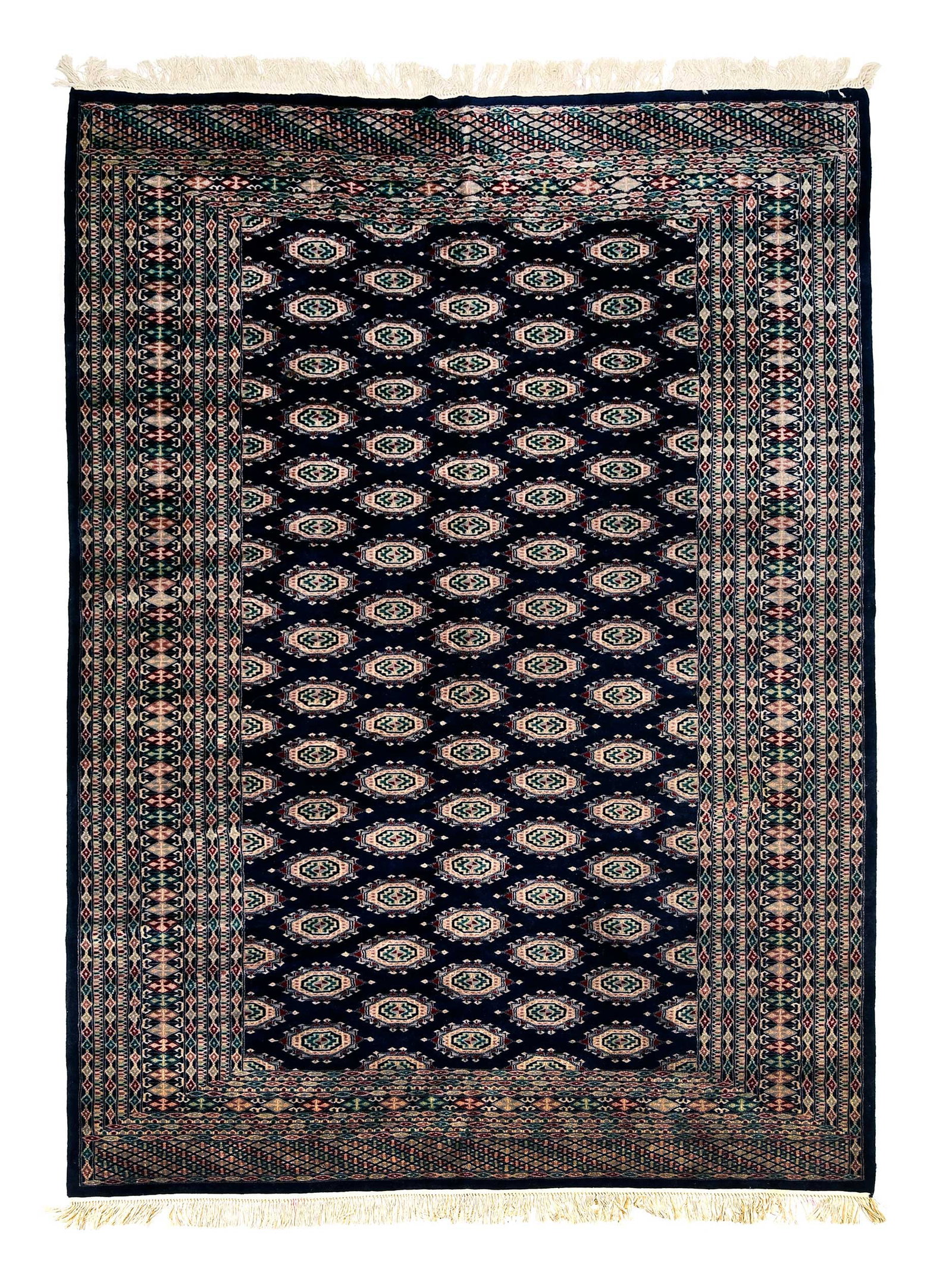Bokharra Rug: 20th century, blue field with repeating medallions, multiple geometric borders, 9 ft. 1 in. 6 ft. 1 in. Provenance: Private Asheville Collection