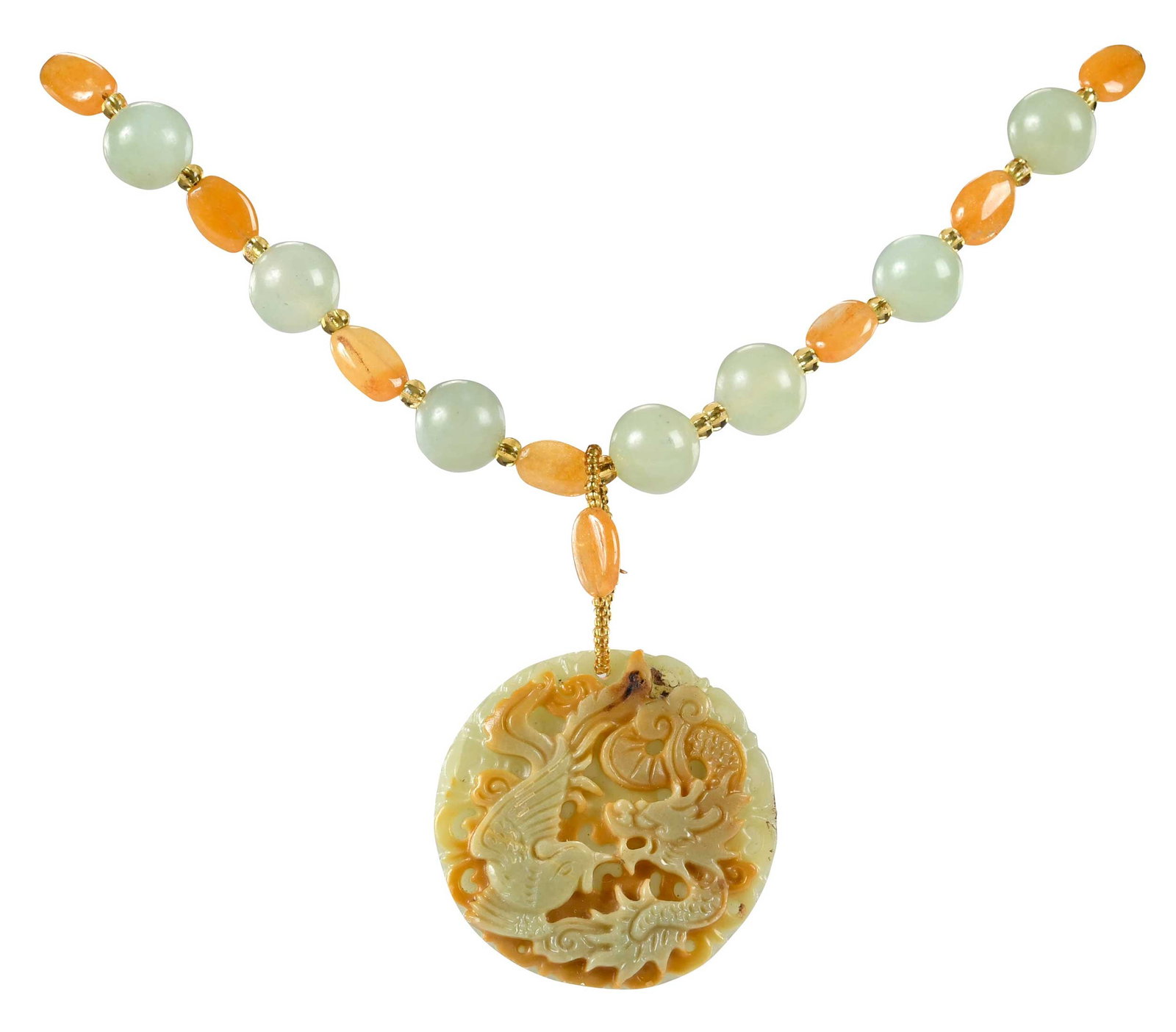 Dragon and Phoenix Carved Jade Pendant on Bead Necklace: carved disc, approx. 50.0mm diameter, alternating green and yellow jade beads, 27 in. length, 109.8 g Provenance: Private Collection Note: This item tests as Jadeite on the Presidium Gem Tester II. Br